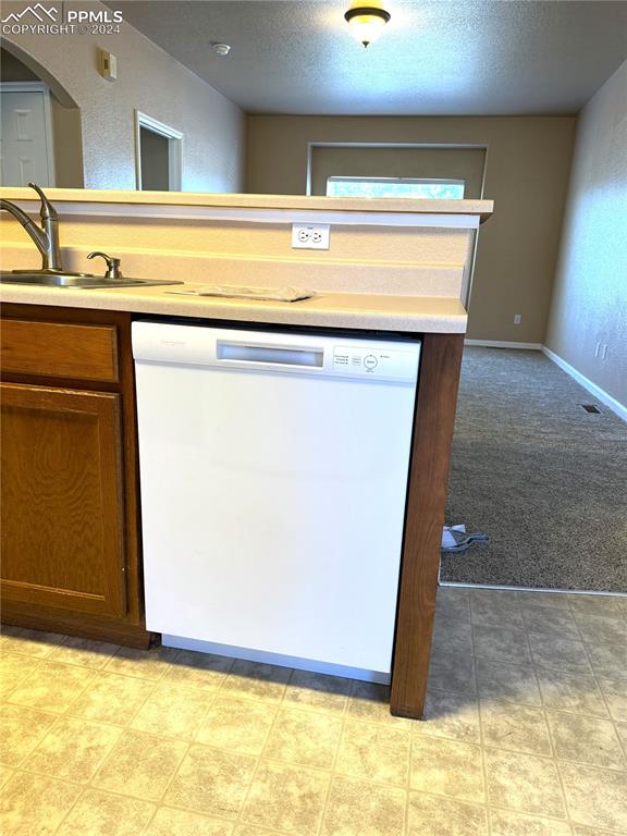 9395 Trailside View, Unit 1 Fountain, CO 80817 - Photo 4 of 13 a view of a kitchen with a sink