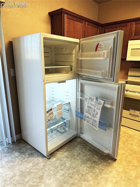 9395 Trailside View, Unit 1 Fountain, CO 80817 - Photo 6 of 13 a view of washer and dryer