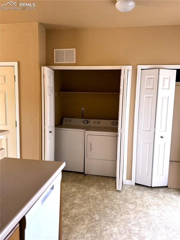 9395 Trailside View, Unit 1 Fountain, CO 80817 - Photo 7 of 13 a view of a kitchen with a sink