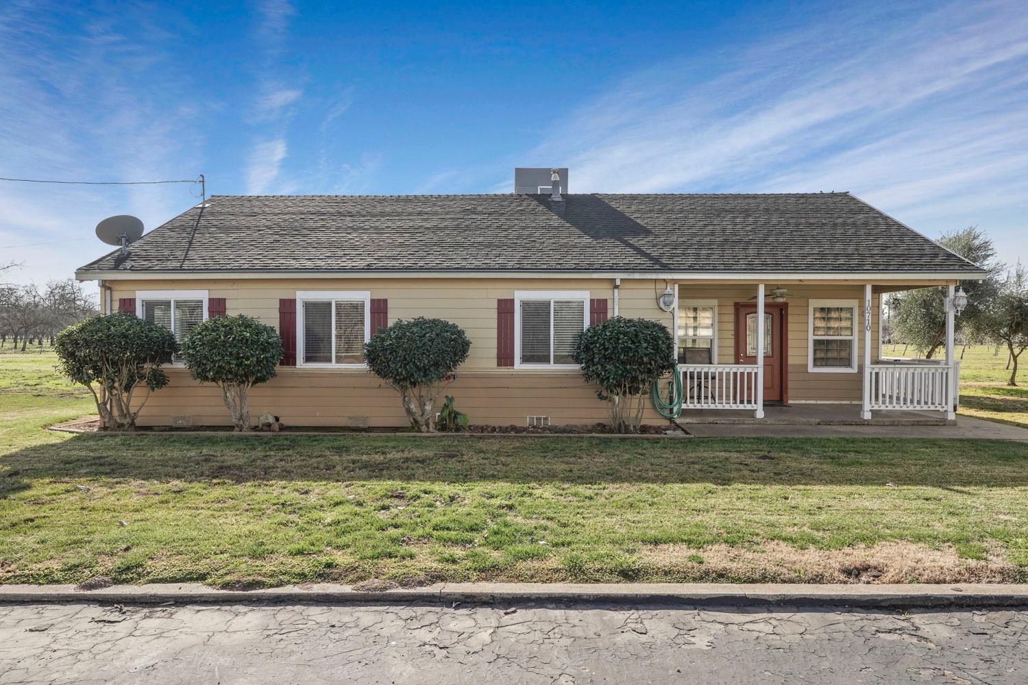 10710 North Shelton Road Linden, CA 95236 - Photo 30 of 75 a front view of a house with garden