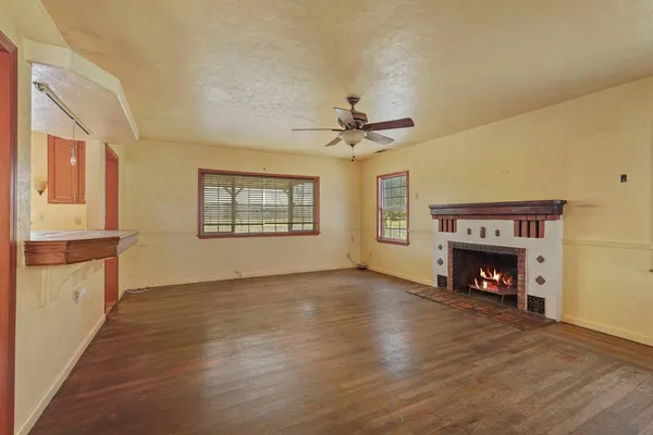 a view of a patio with wooden floor