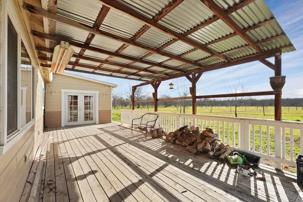 a view of a house with a snow in the background