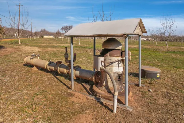 an aerial view of a house with outdoor space