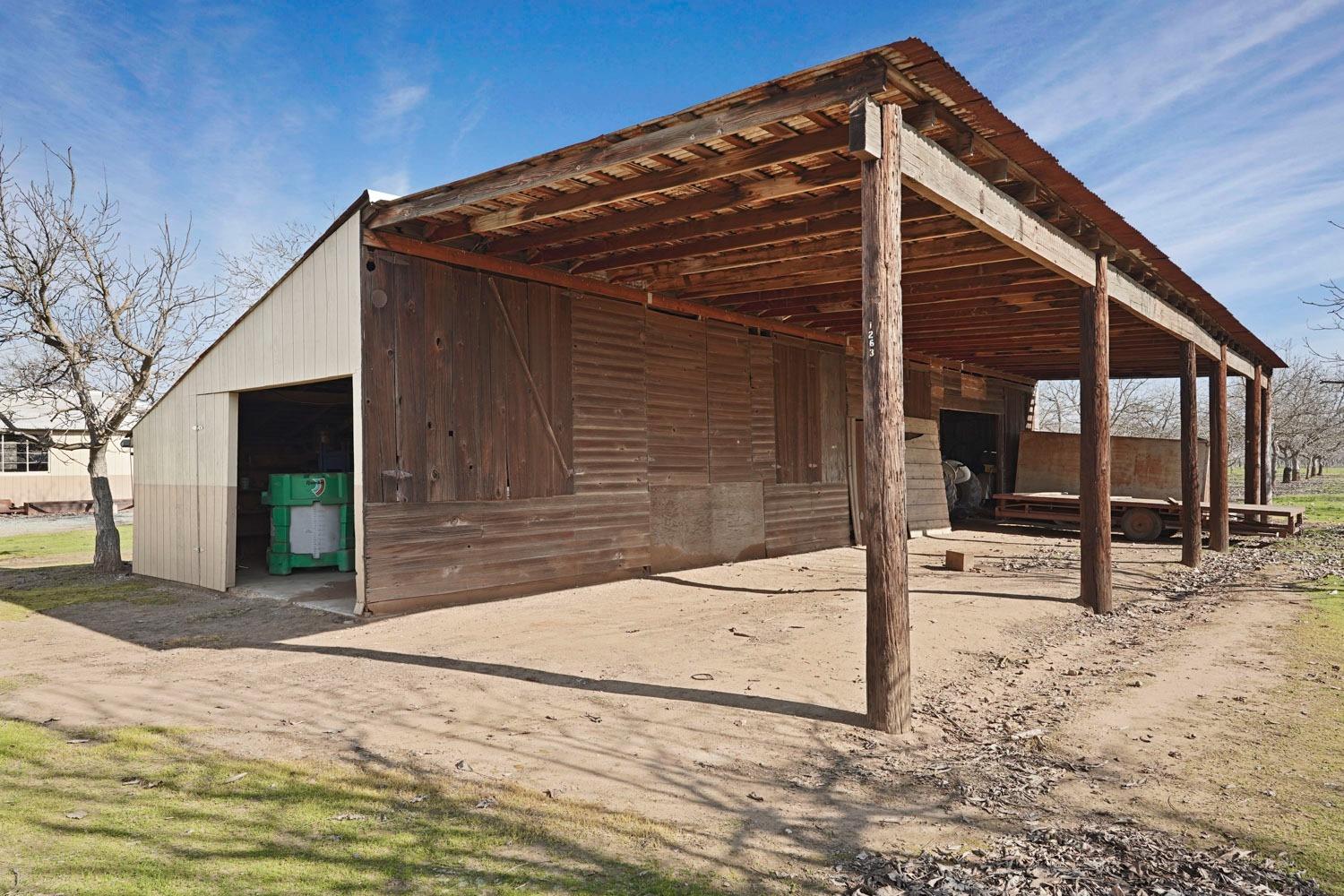 10710 North Shelton Road Linden, CA 95236 - Photo 69 of 75 a view of a house with a wooden fence