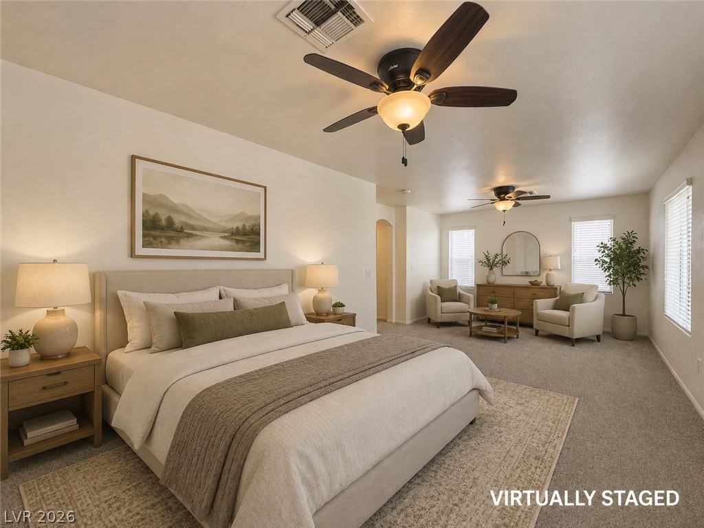 9456 Grandview Spring Avenue Las Vegas, NV 89166 - Photo 21 of 49 Virtually Staged. Comfortable primary bedroom with ceiling fans for optimal air circulation.