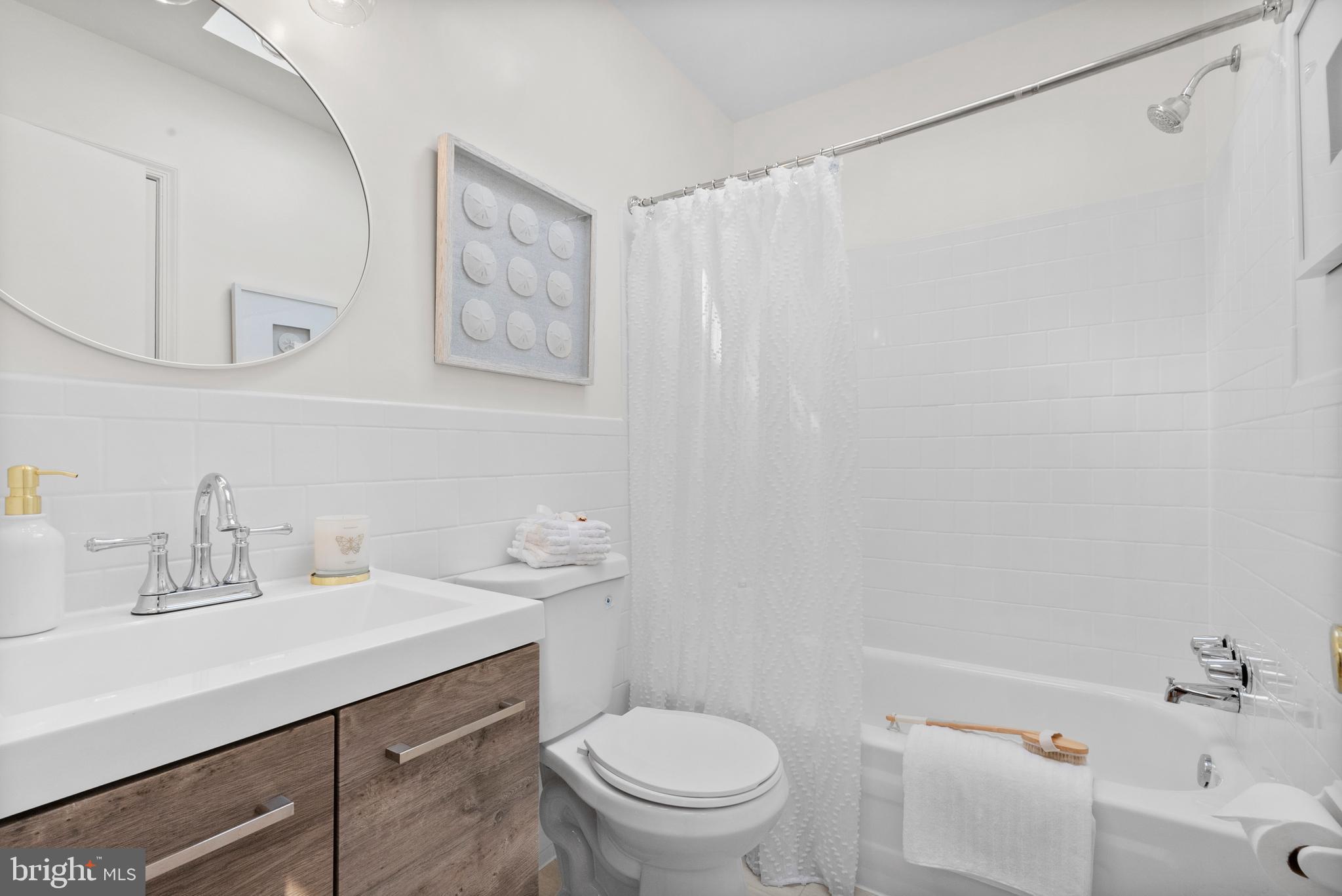 622 14th Place Northeast Washington, DC 20002 - Photo 30 of 37 Striking updated full bath with skylight & closet