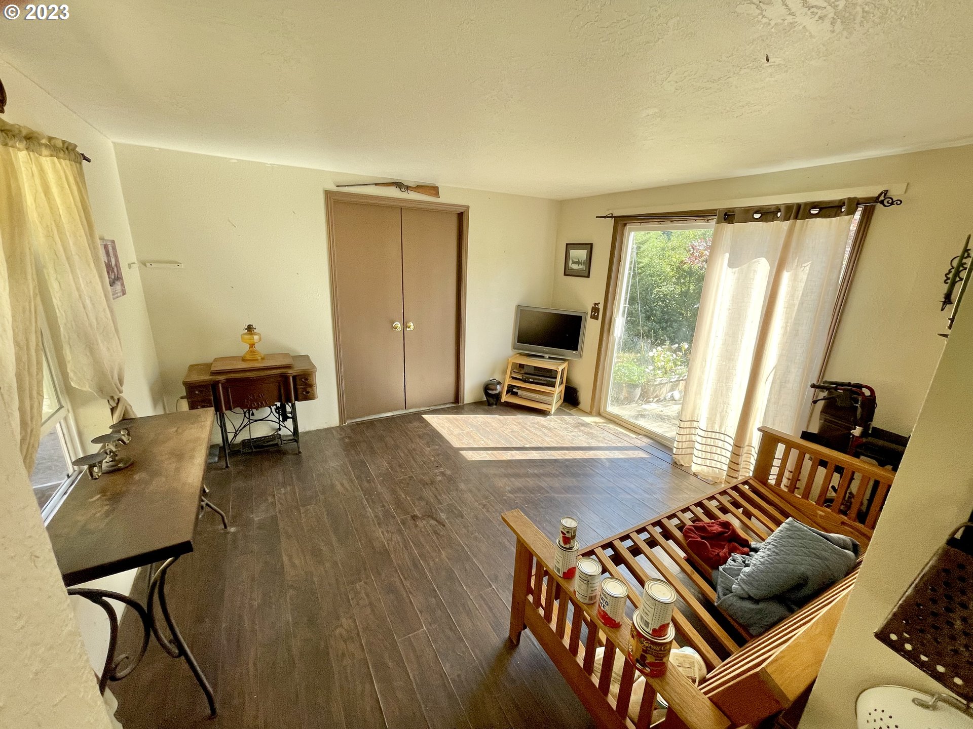 49008 Eckley Mountain Road Broadbent, OR 97414 - Photo 3 of 48 a living room with furniture and wooden floor