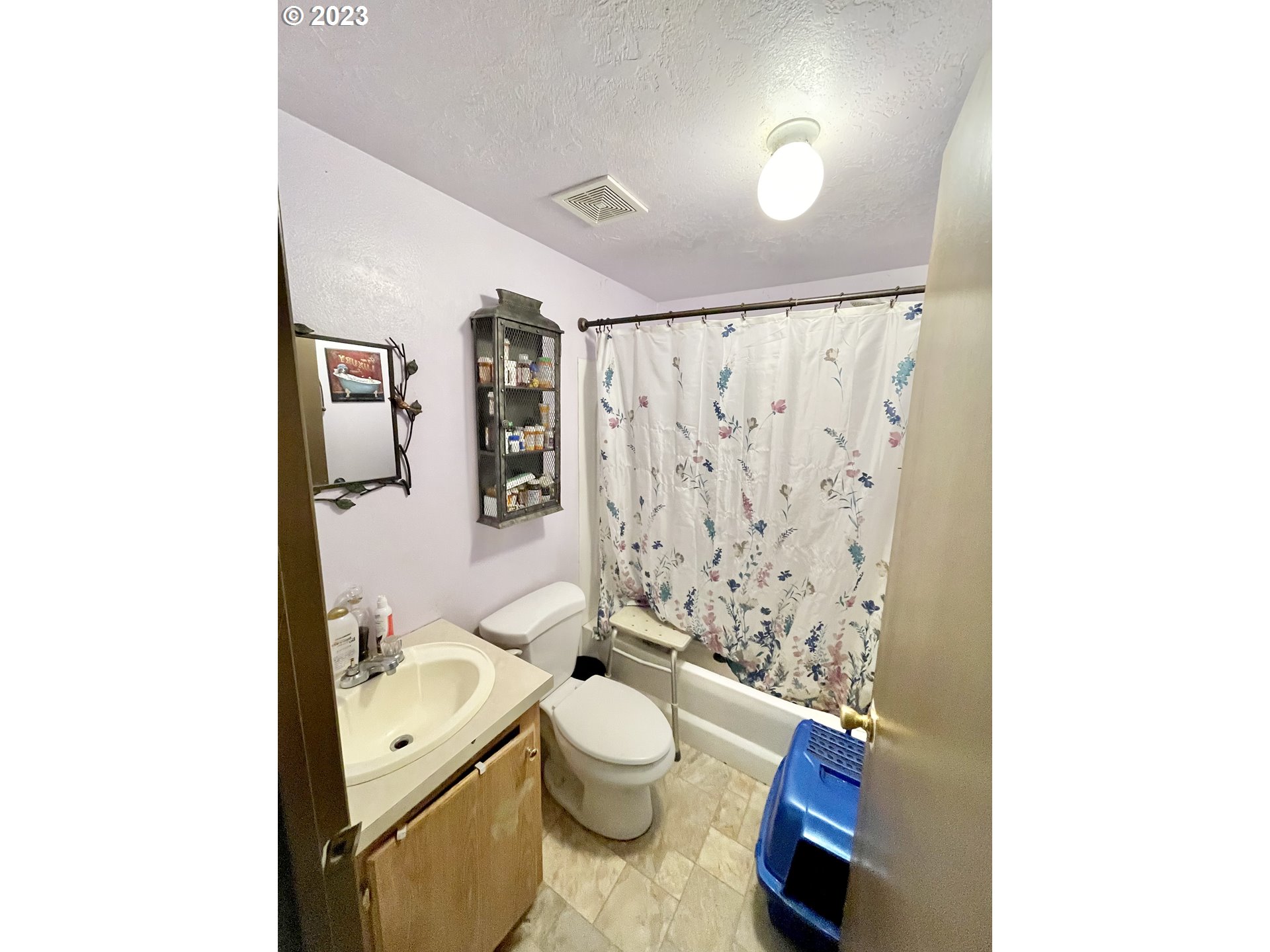 49008 Eckley Mountain Road Broadbent, OR 97414 - Photo 5 of 48 a bathroom with a granite countertop toilet sink and mirror