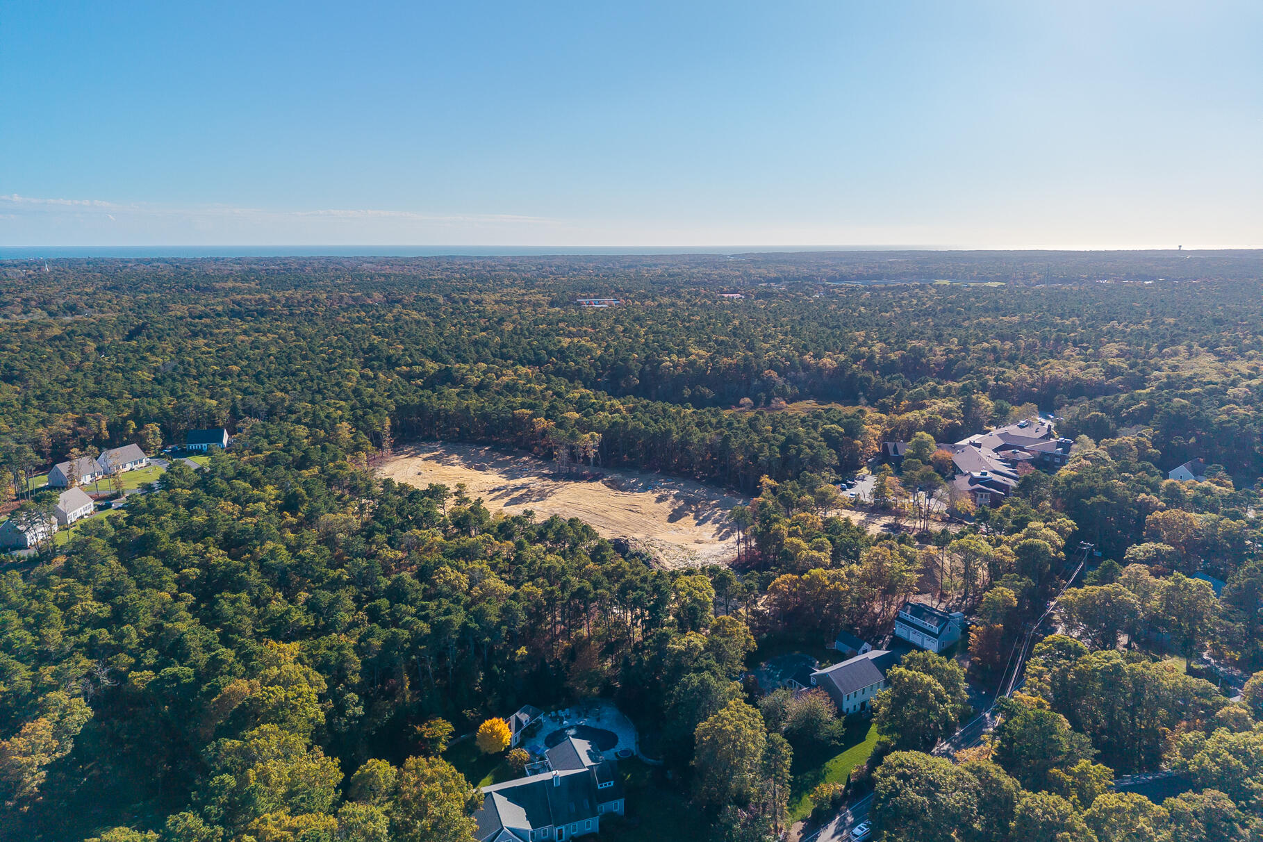 3 Bentley Road Harwich, MA 02645 - Photo 9 of 23 an aerial view of house with yard and mountain view in back