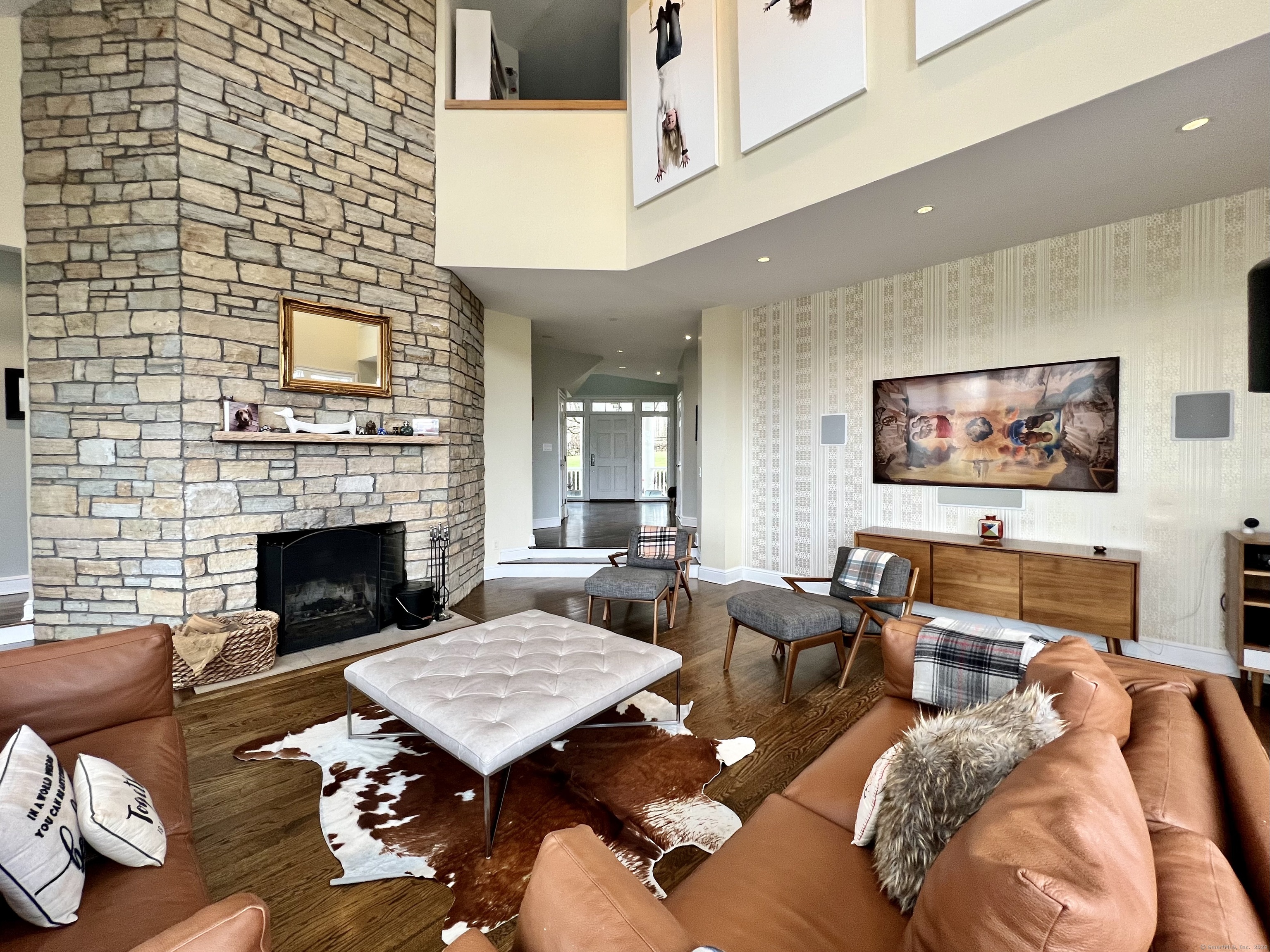 172 Umpawaug Road Redding, CT 06896 - Photo 14 of 38 a living room with furniture and a fireplace
