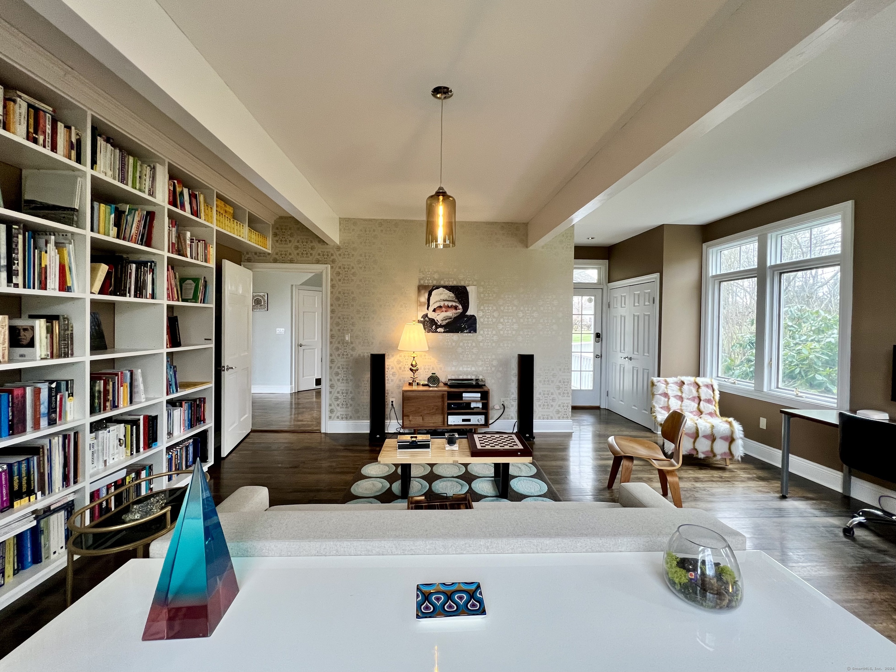 172 Umpawaug Road Redding, CT 06896 - Photo 15 of 38 a living room with furniture window and book shelf