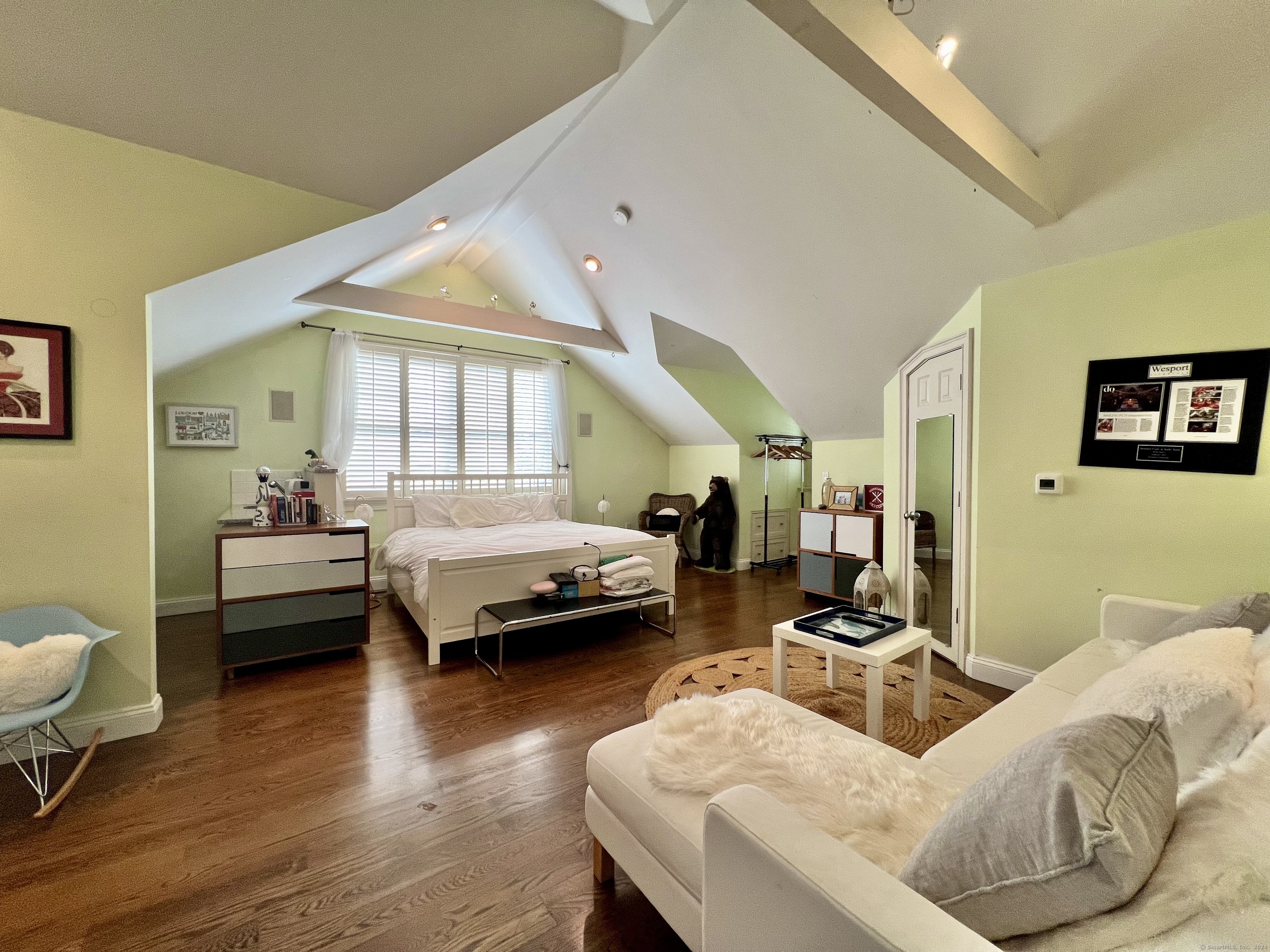 172 Umpawaug Road Redding, CT 06896 - Photo 22 of 38 a bedroom with furniture and wooden floor