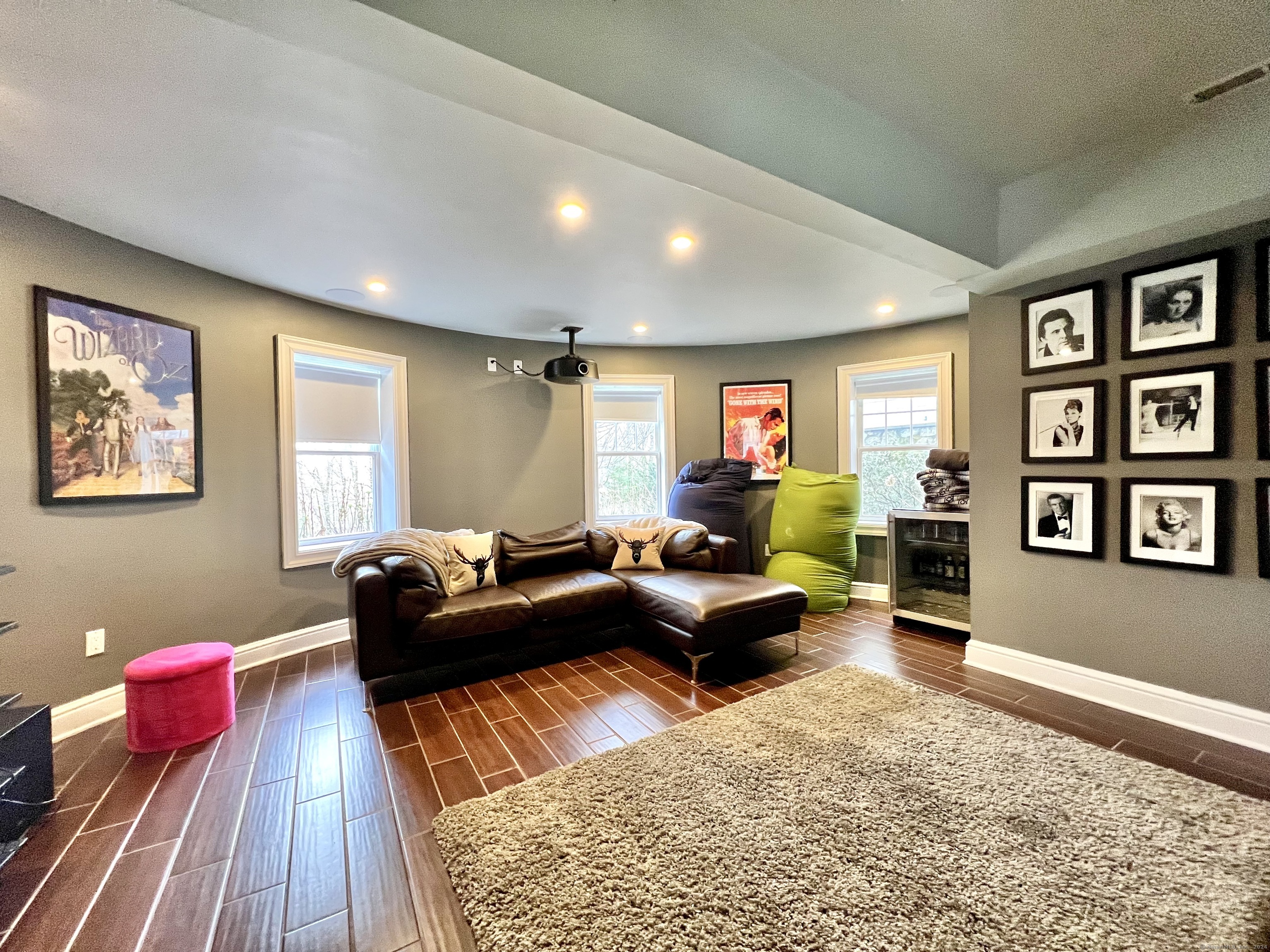 172 Umpawaug Road Redding, CT 06896 - Photo 29 of 38 a living room with furniture or couch and a bookshelf