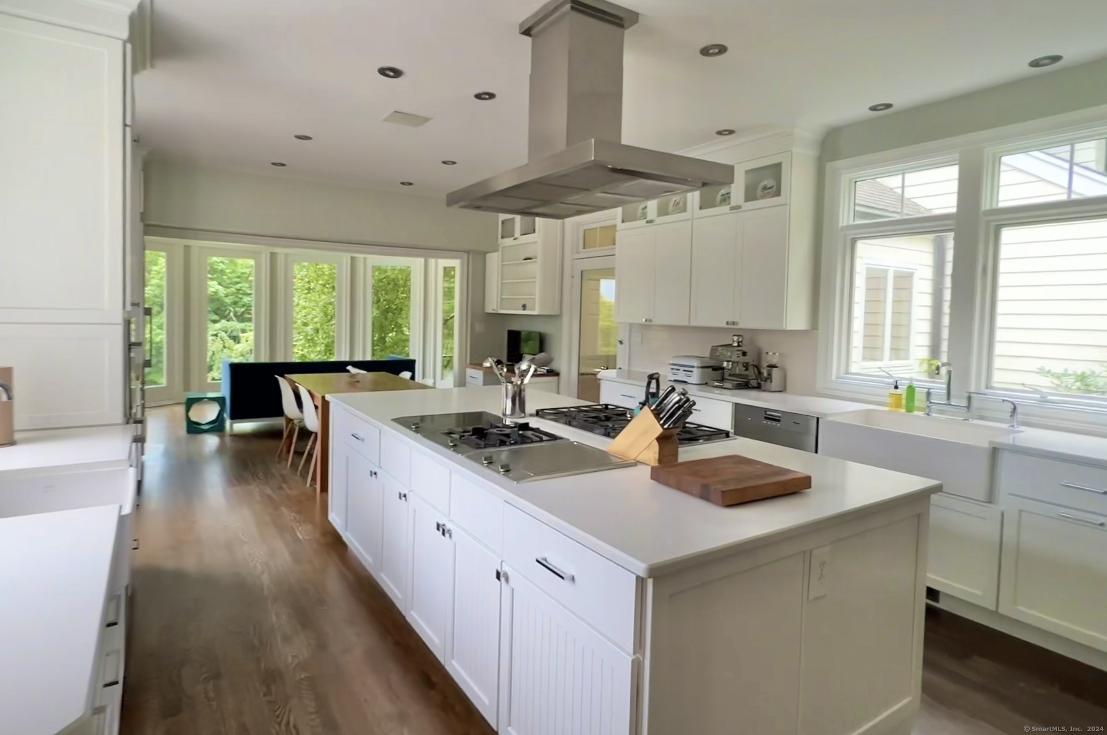 172 Umpawaug Road Redding, CT 06896 - Photo 5 of 38 a kitchen with a sink stove and cabinets