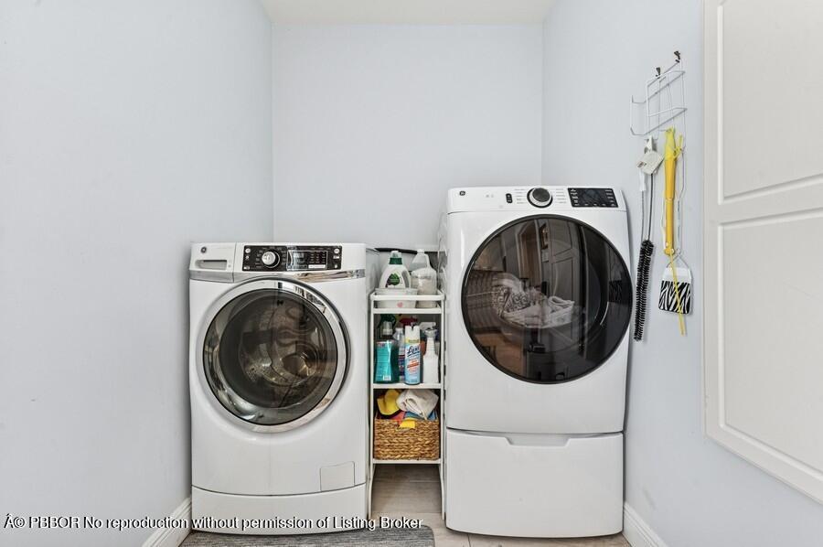 310 Almeria Road West Palm Beach, FL 33405 - Photo 31 of 71 31_310AlmeriaRd_350_LaundryRoom_Small