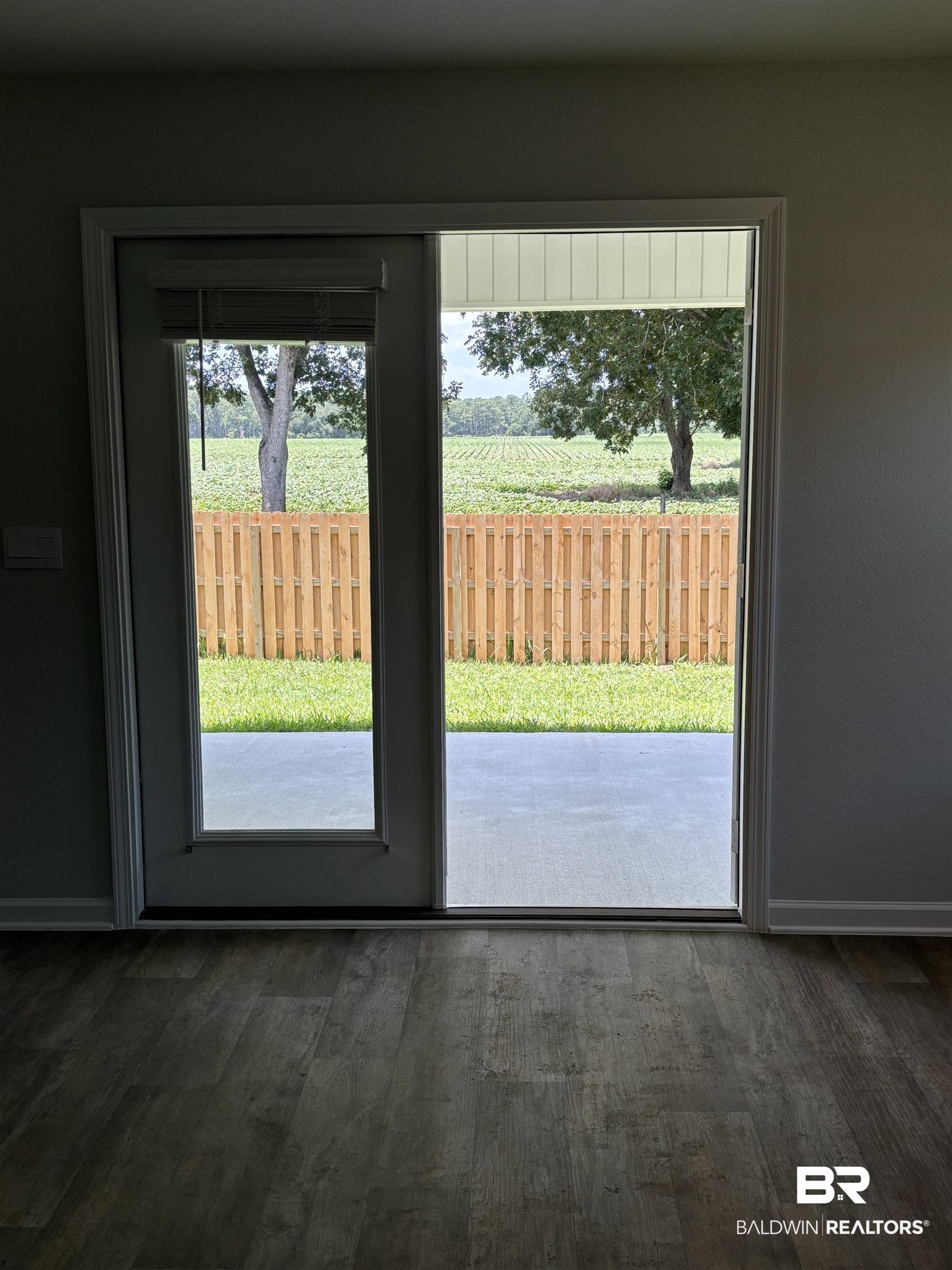 24504 Ponder Loop Loxley, AL 36551 - Photo 11 of 50 Back Doors Looking Out Ba