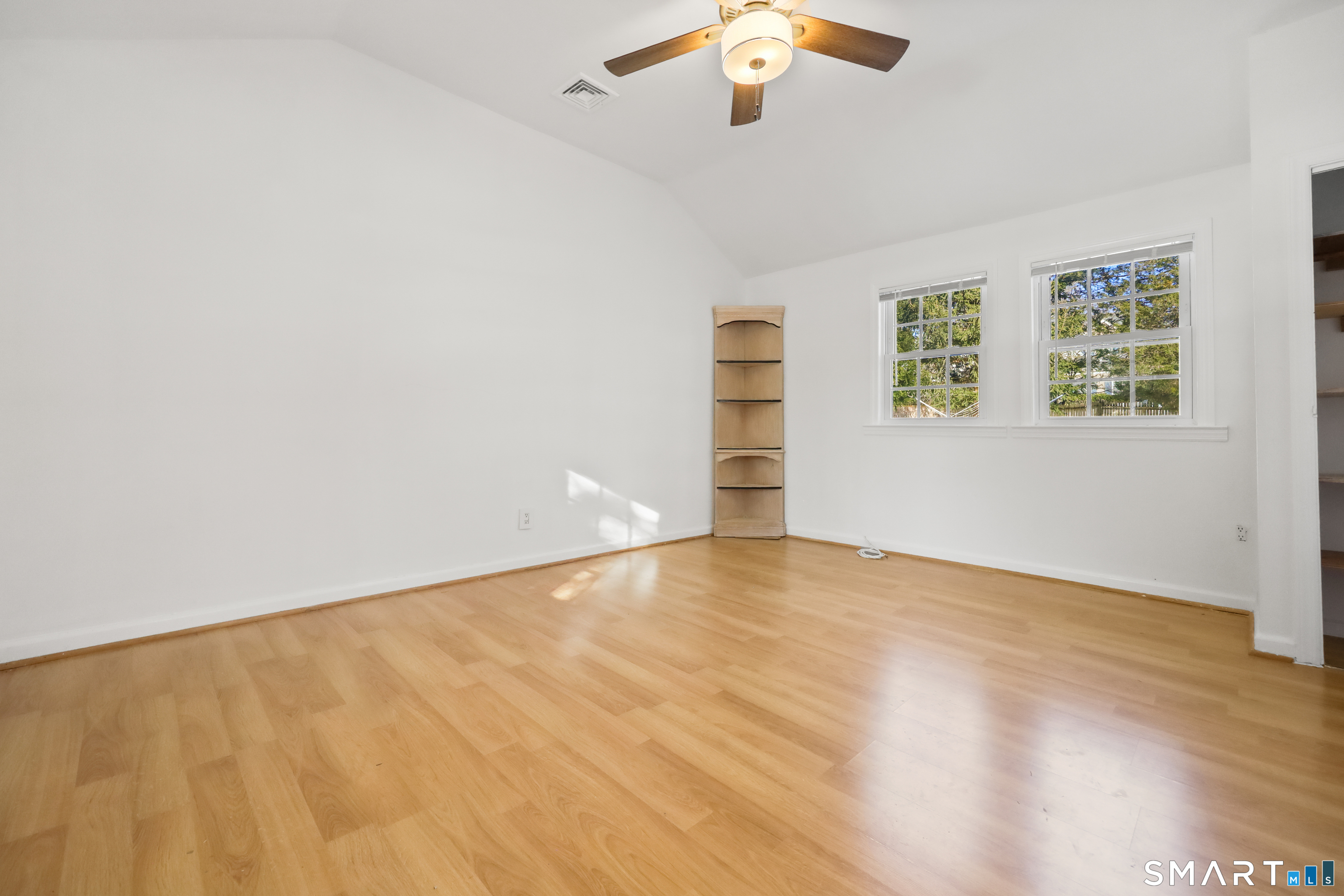 1215 Westover Road Stamford, CT 06902 - Photo 16 of 27 an empty room with a empty space and a window