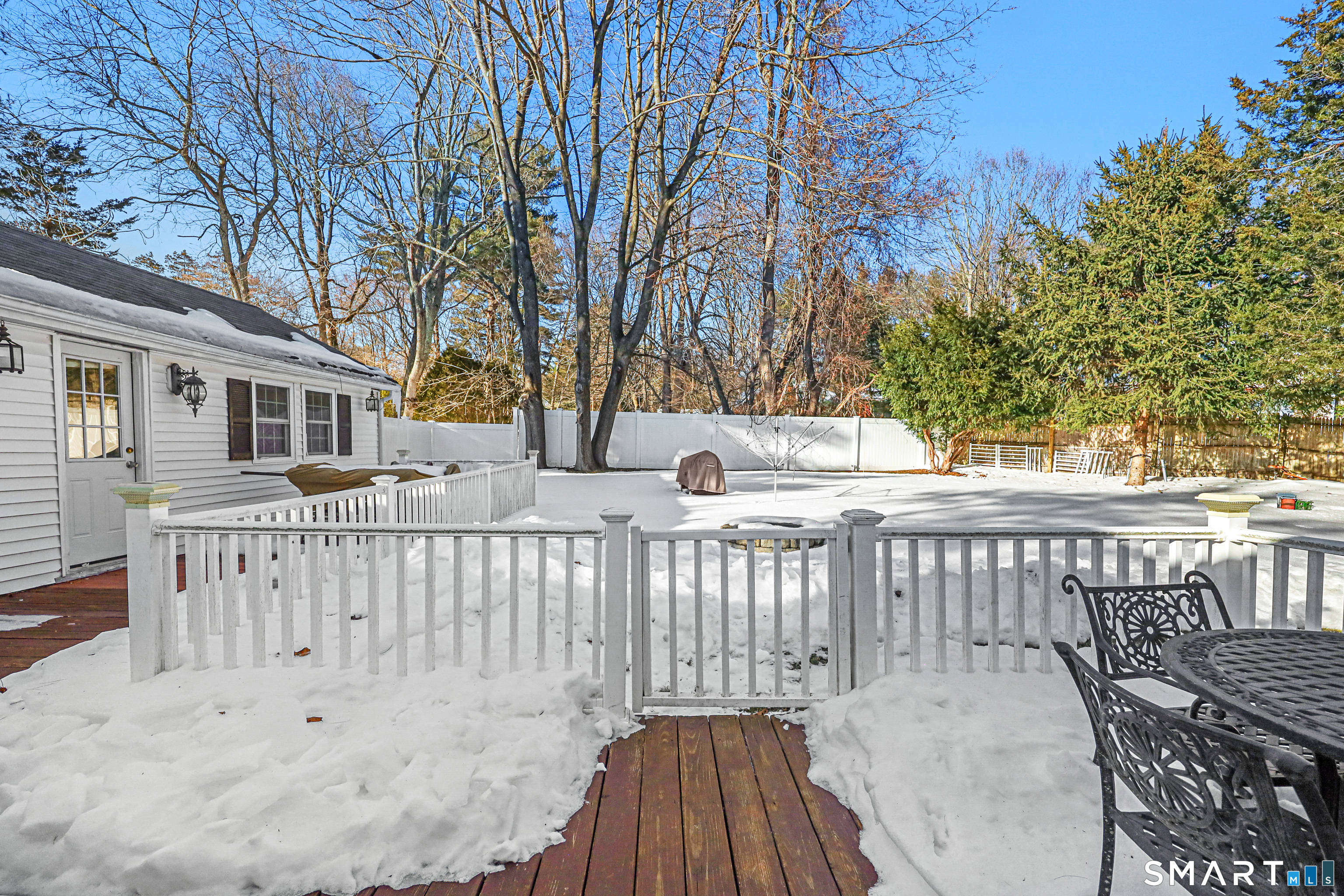 1215 Westover Road Stamford, CT 06902 - Photo 20 of 27 a view of a chair and table in the deck