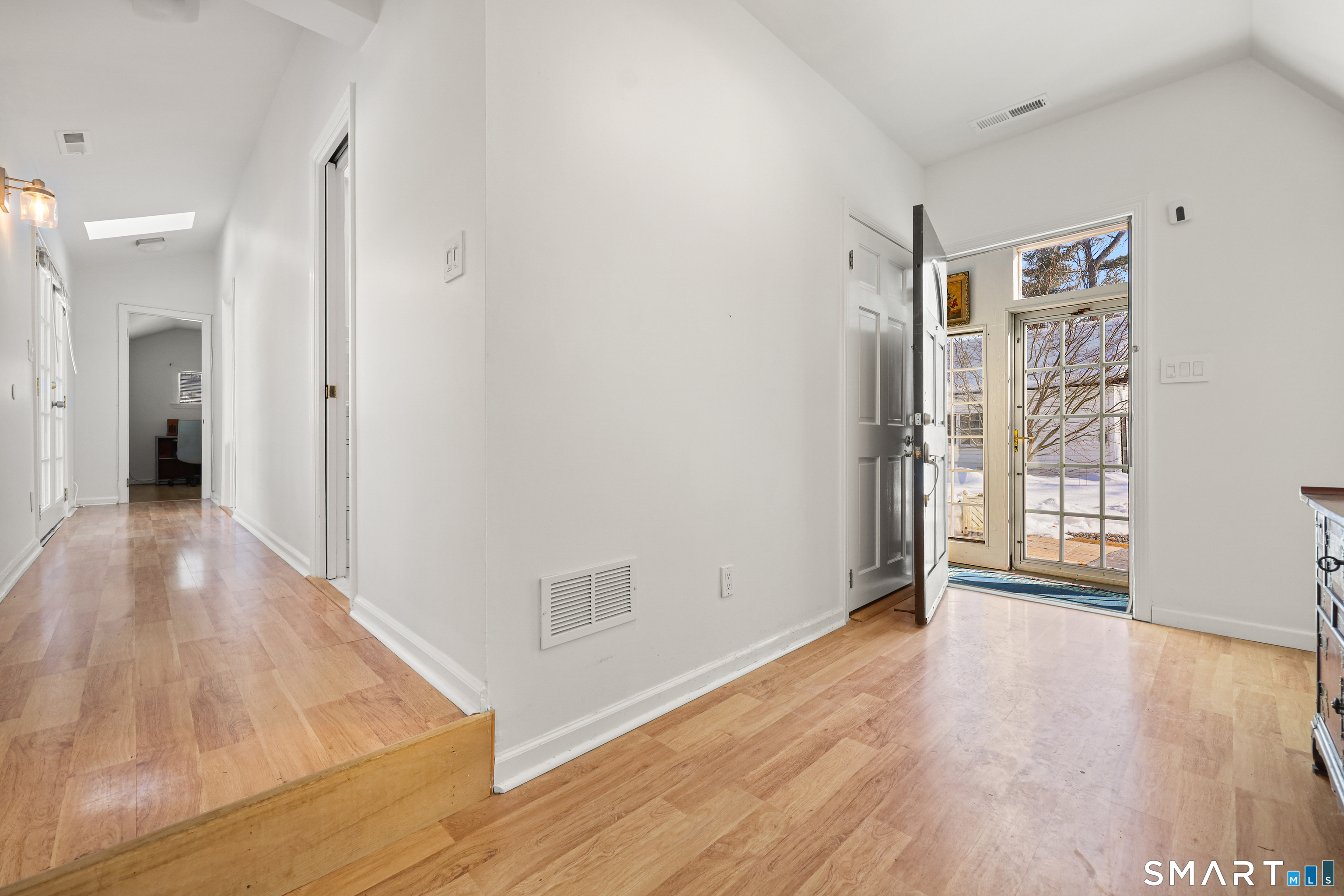 1215 Westover Road Stamford, CT 06902 - Photo 2 of 27 wooden floor in an empty room