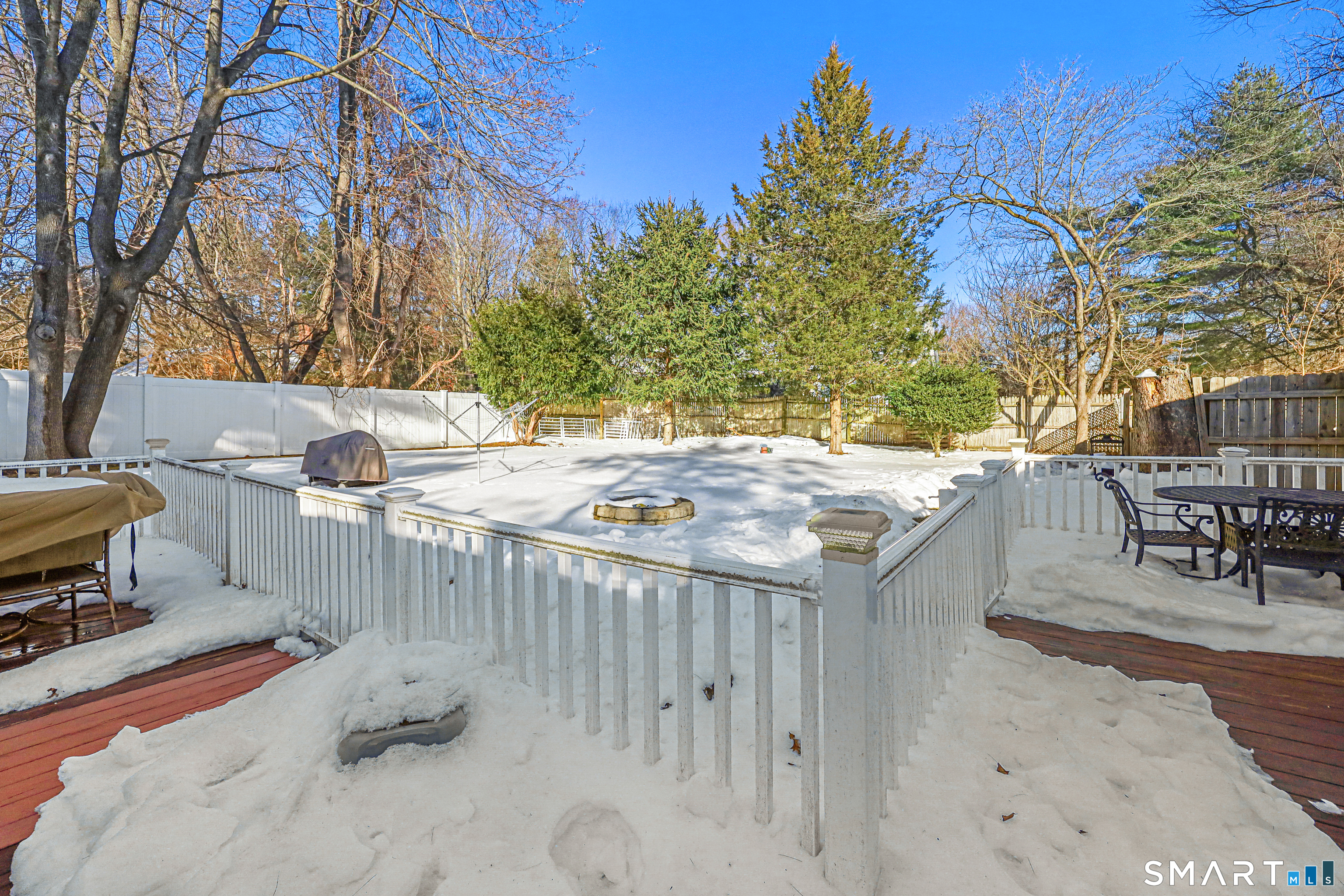 1215 Westover Road Stamford, CT 06902 - Photo 21 of 27 a view of a backyard with sitting area