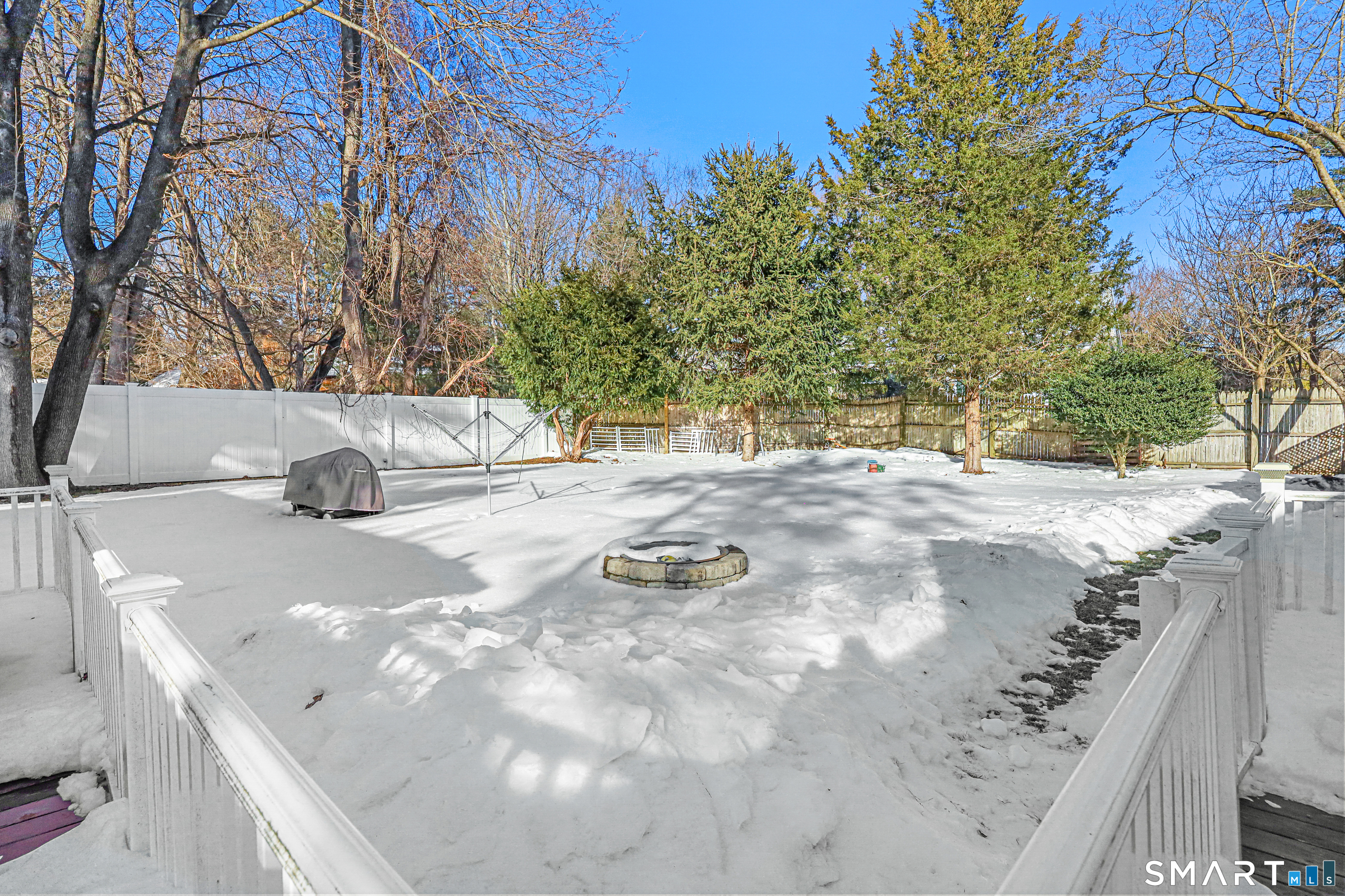 1215 Westover Road Stamford, CT 06902 - Photo 22 of 27 a view of a backyard of the house