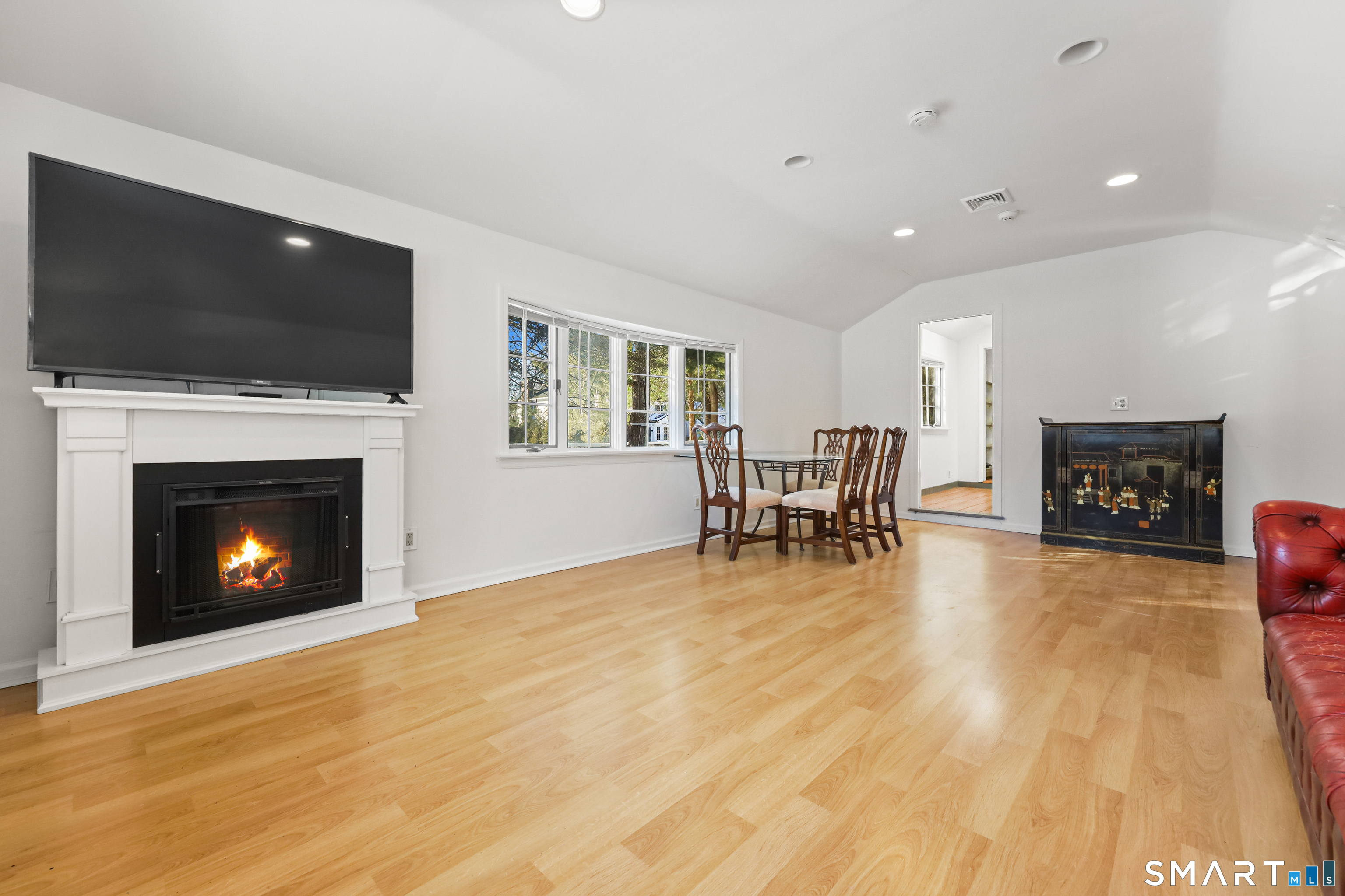 1215 Westover Road Stamford, CT 06902 - Photo 3 of 27 a view of a livingroom with a fireplace and a fireplace