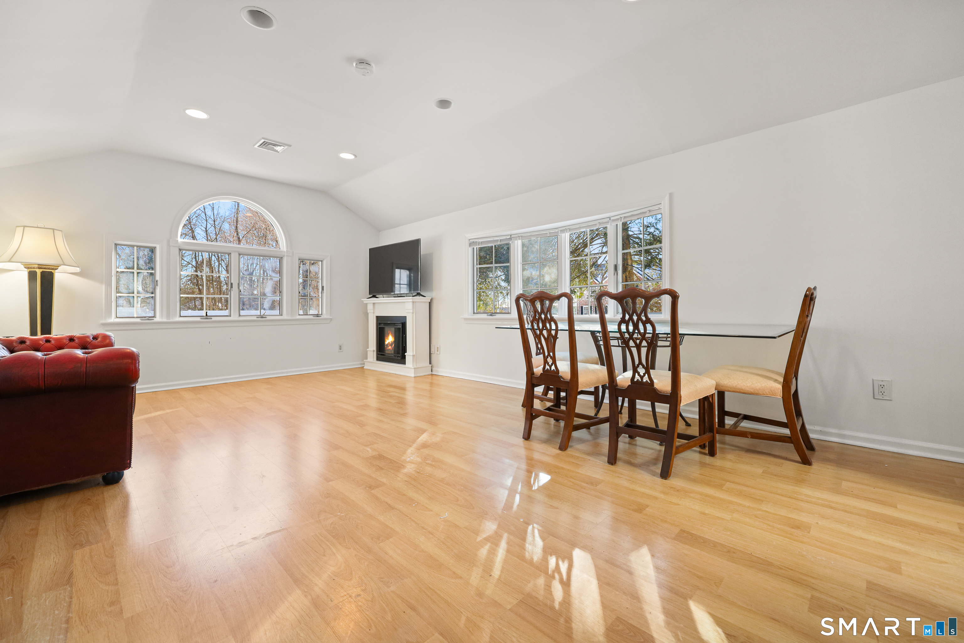 1215 Westover Road Stamford, CT 06902 - Photo 5 of 27 a view of a dining room with furniture and a large window