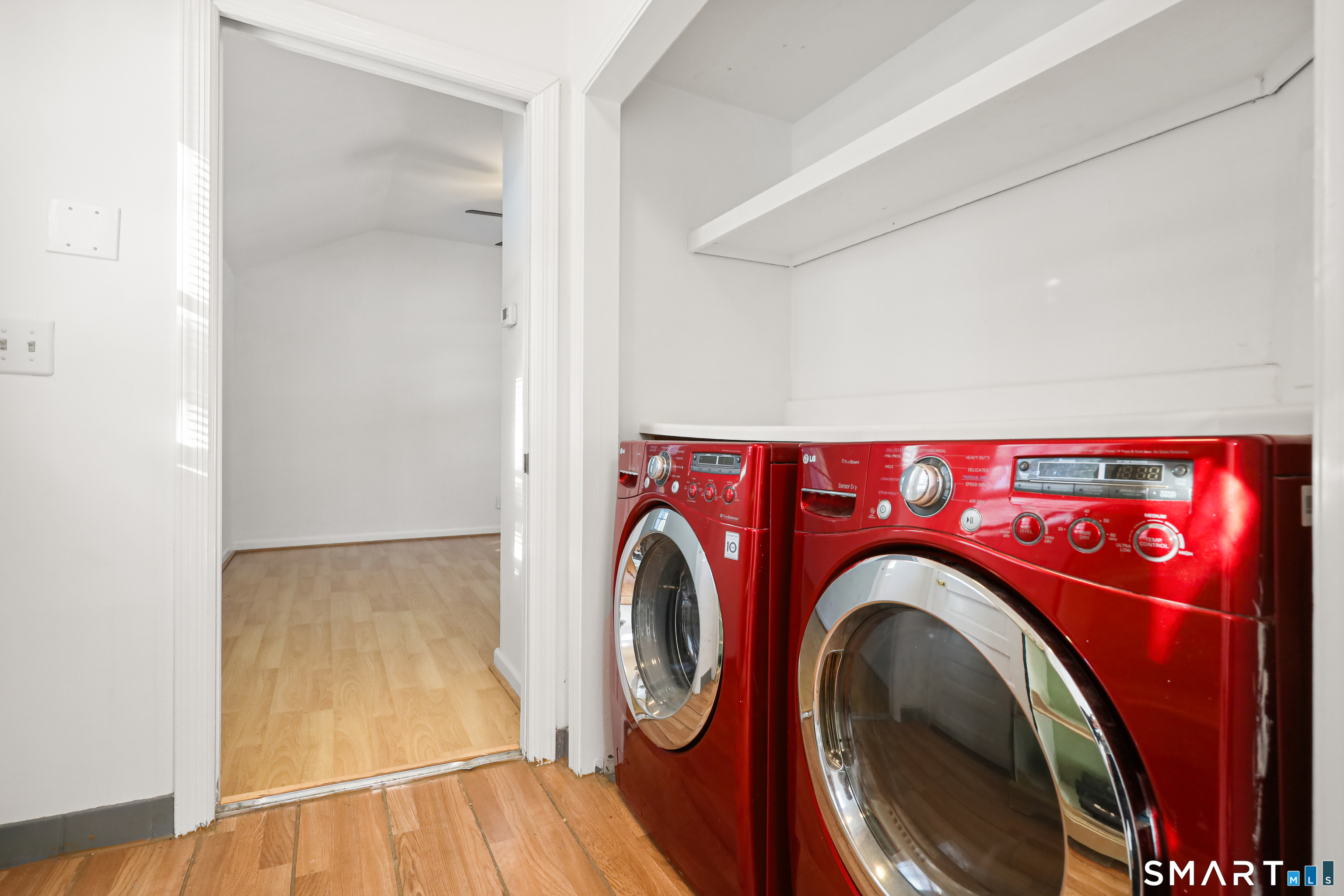 1215 Westover Road Stamford, CT 06902 - Photo 9 of 27 a utility room with dryer and washer