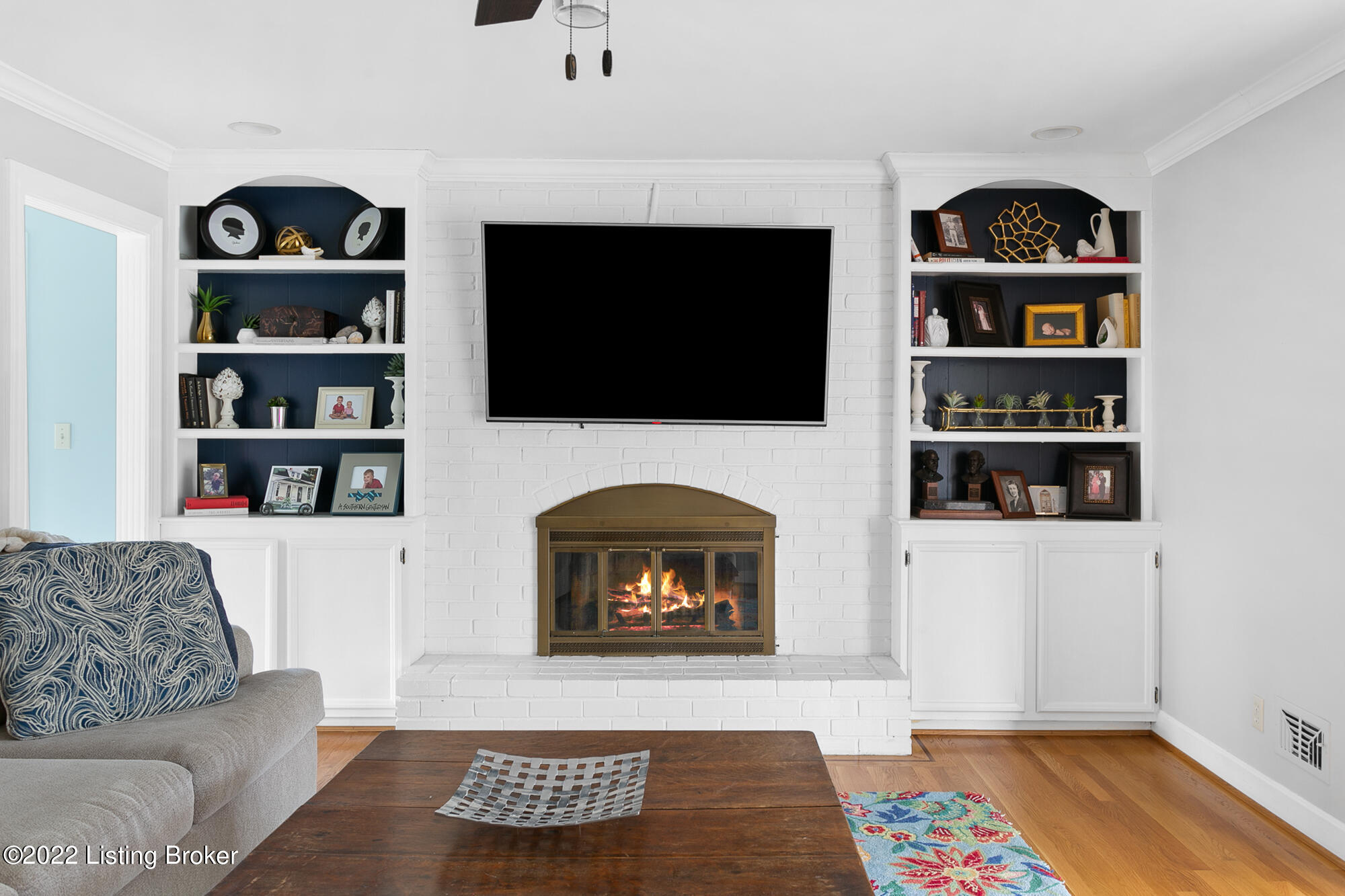 5300 Pueblo Road Louisville, KY 40207 - Photo 17 of 59 Family room bookcase and fireplace