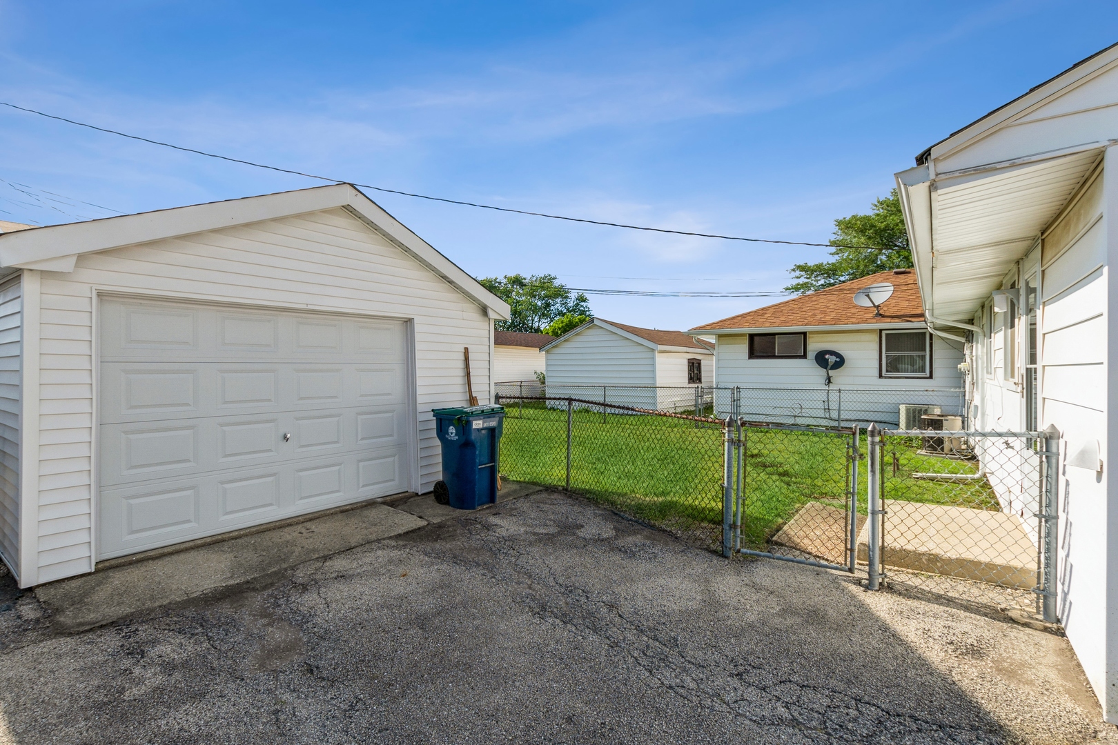 8734 South Corcoran Road Hometown, IL 60456 - Photo 15 of 15 a view of a house with a backyard
