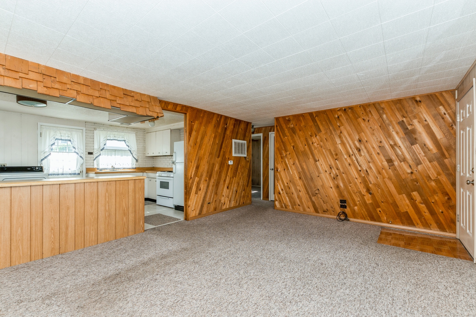 8734 South Corcoran Road Hometown, IL 60456 - Photo 4 of 15 a view of a room with wooden walls