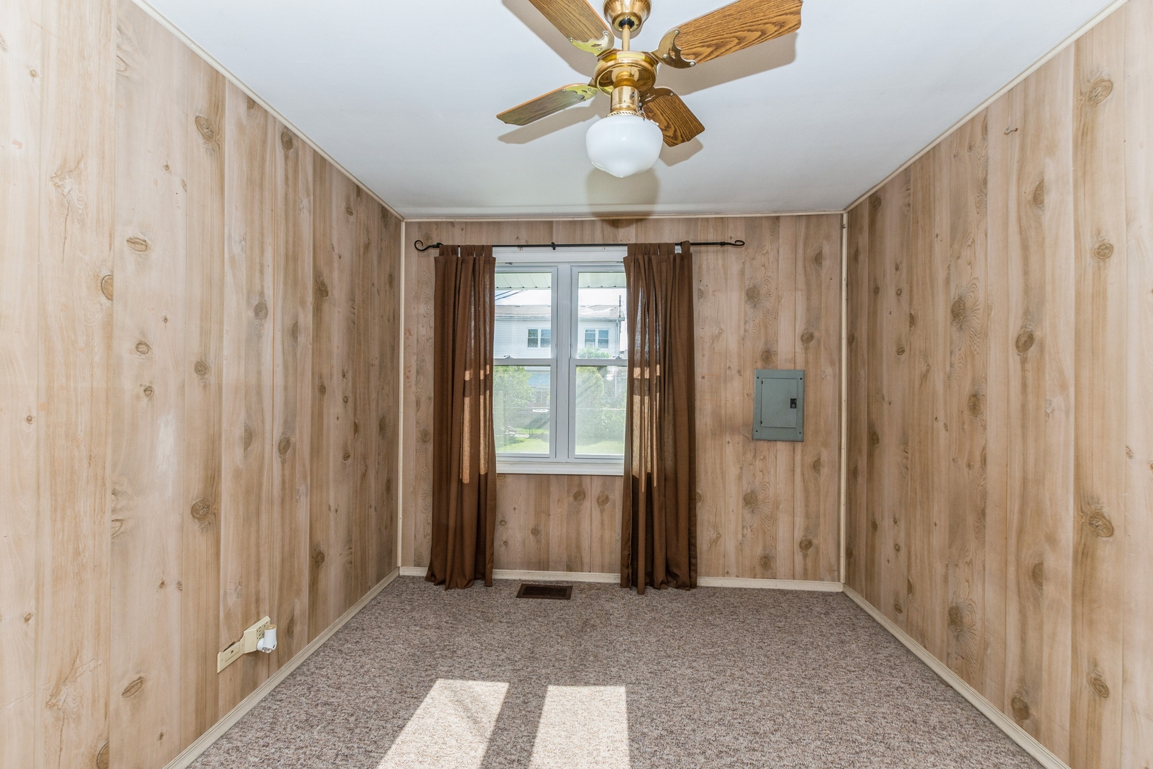 8734 South Corcoran Road Hometown, IL 60456 - Photo 10 of 15 a view of a hallway with a chandelier fan and windows