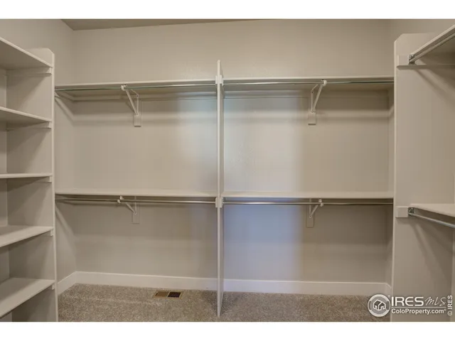 a picture of a room with shelf