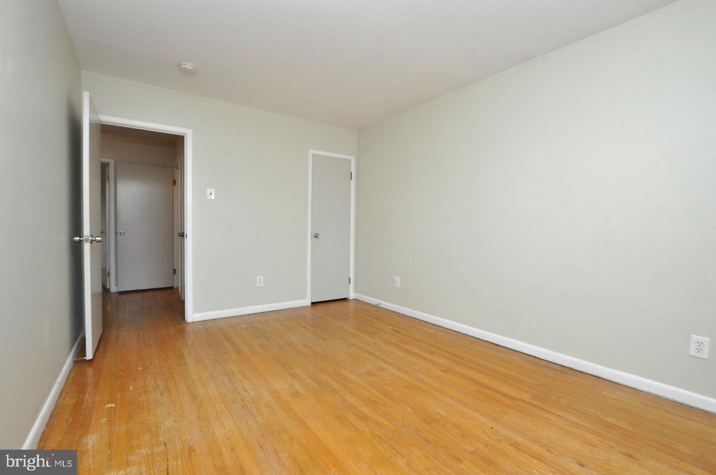 210 Philellena Road Cherry Hill, NJ 08034 - Photo 20 of 30 a view of an empty room with wooden floor and a window