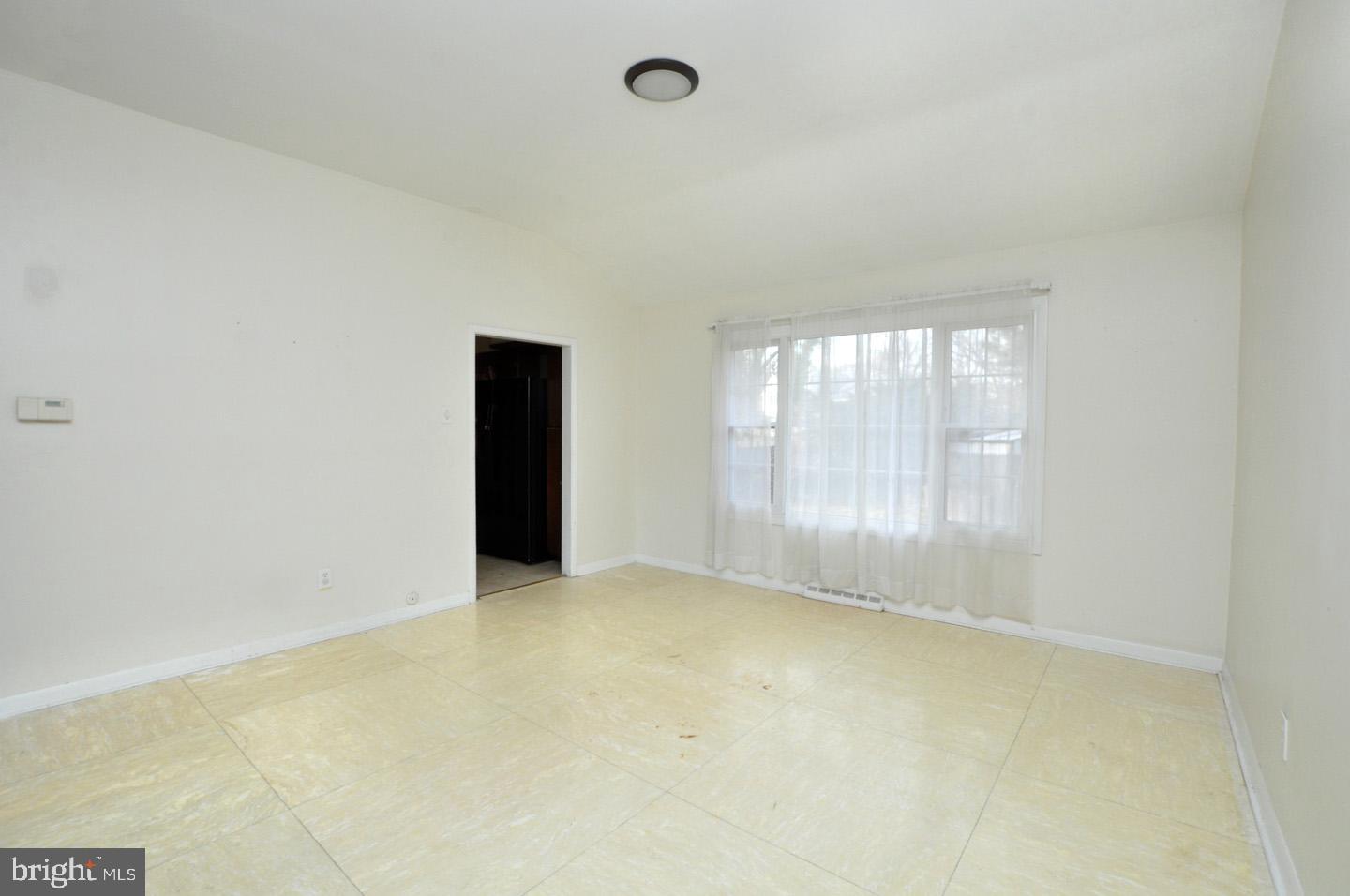210 Philellena Road Cherry Hill, NJ 08034 - Photo 5 of 30 a view of an empty room with a window