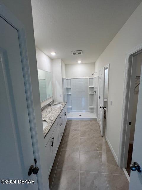 1320 Cork Drive Ormond Beach, FL 32174 - Photo 14 of 25 a bathroom with double vanity and a shower
