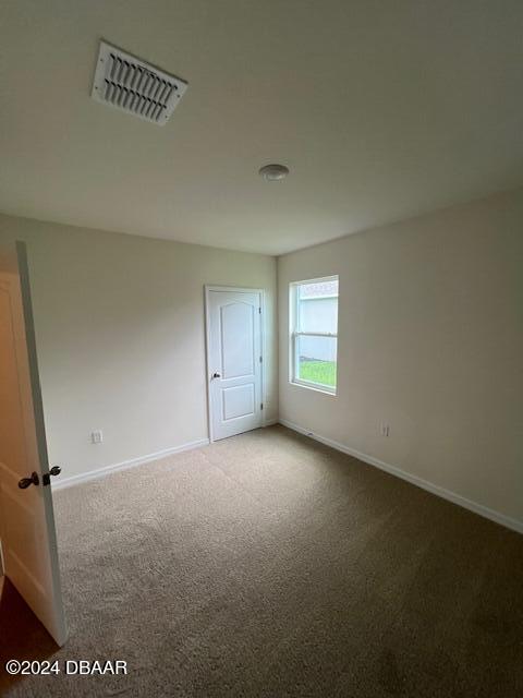 1320 Cork Drive Ormond Beach, FL 32174 - Photo 21 of 25 an empty room with a window