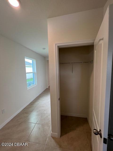 1320 Cork Drive Ormond Beach, FL 32174 - Photo 23 of 25 an empty room with windows and entrance