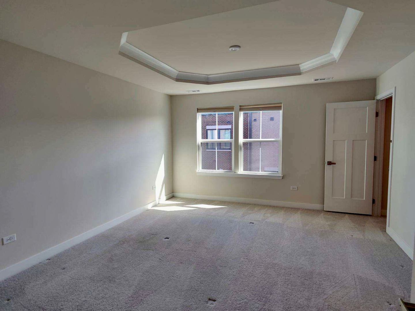 319 Elm Ct., Unit 319 Mount Prospect, IL 60056 - Photo 14 of 21 a view of an empty room with a window