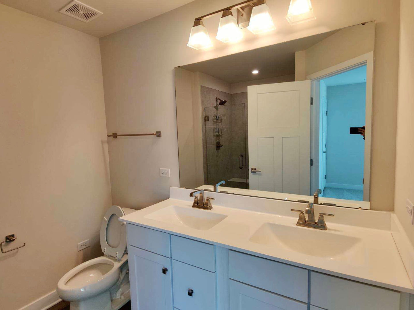 319 Elm Ct., Unit 319 Mount Prospect, IL 60056 - Photo 15 of 21 a bathroom with a sink and a mirror