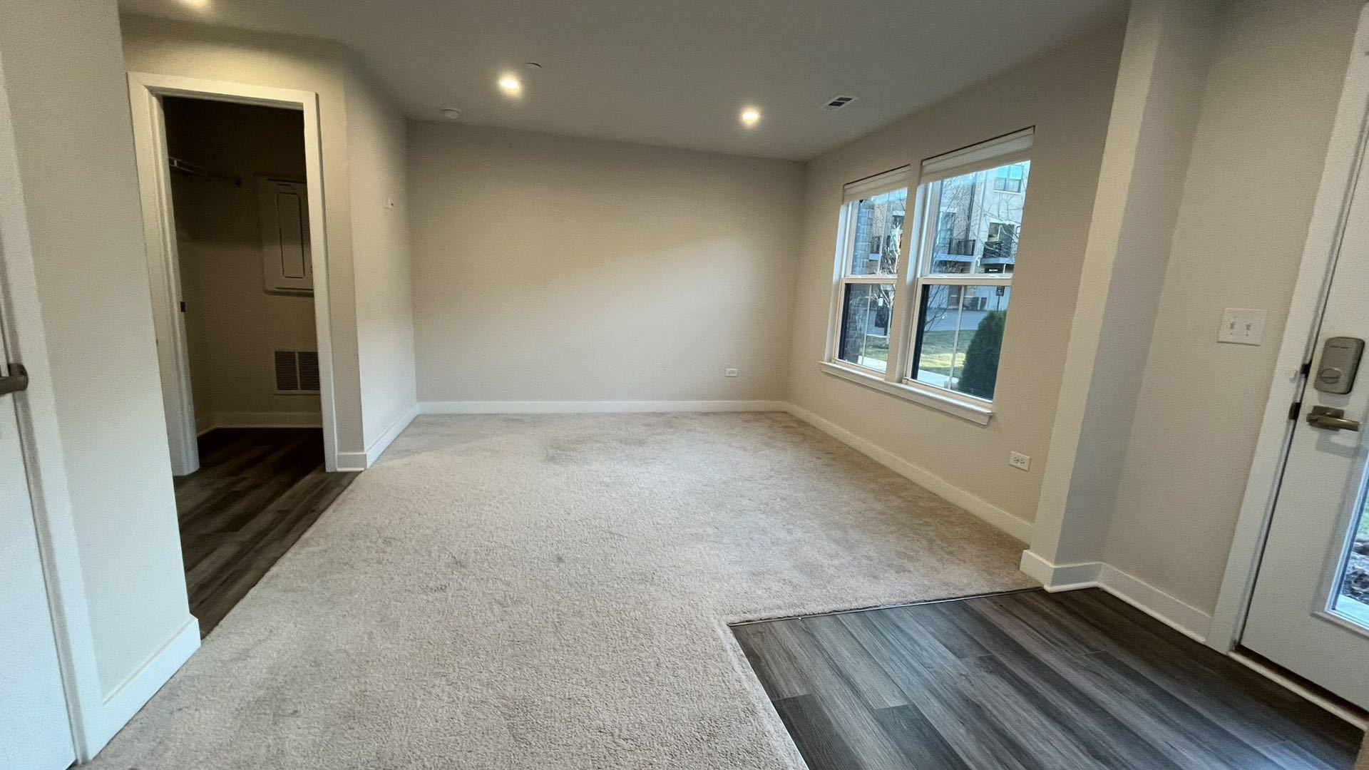 319 Elm Ct., Unit 319 Mount Prospect, IL 60056 - Photo 2 of 21 an empty room with windows