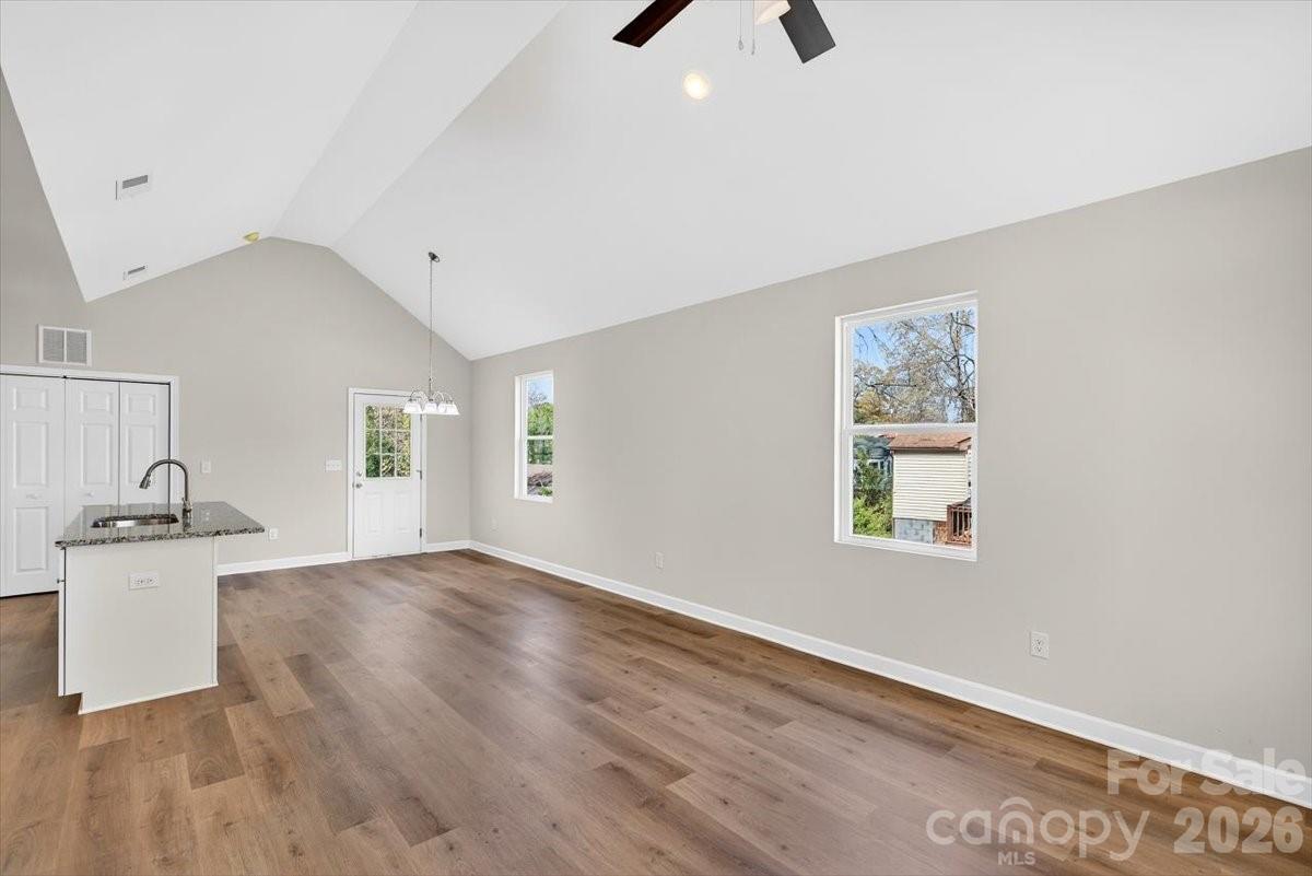 811 Craig Place Shelby, NC 28150 - Photo 11 of 28 wooden floor in an empty room with a window