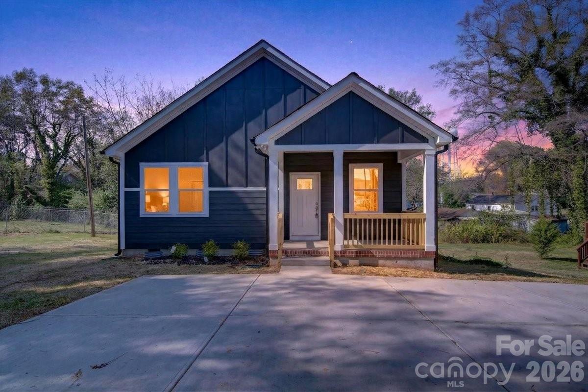 811 Craig Place Shelby, NC 28150 - Photo 2 of 28 a view of house with backyard and garden