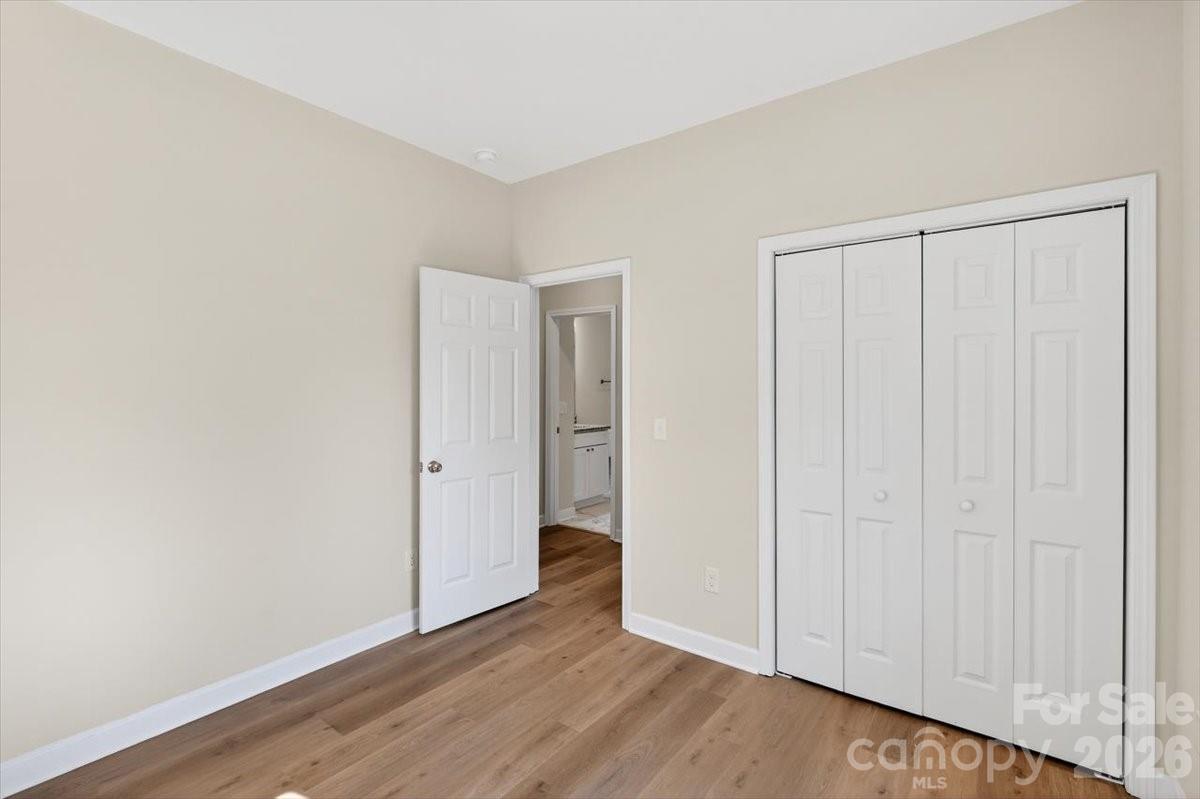 811 Craig Place Shelby, NC 28150 - Photo 21 of 28 a view of an empty room with wooden floor