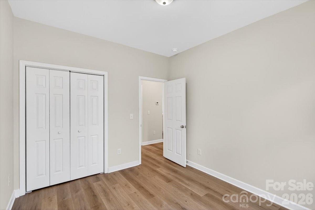 811 Craig Place Shelby, NC 28150 - Photo 23 of 28 a view of an empty room and wooden floor