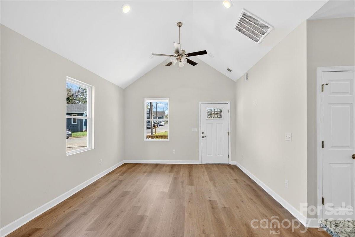 811 Craig Place Shelby, NC 28150 - Photo 4 of 28 wooden floor in an empty room with a window