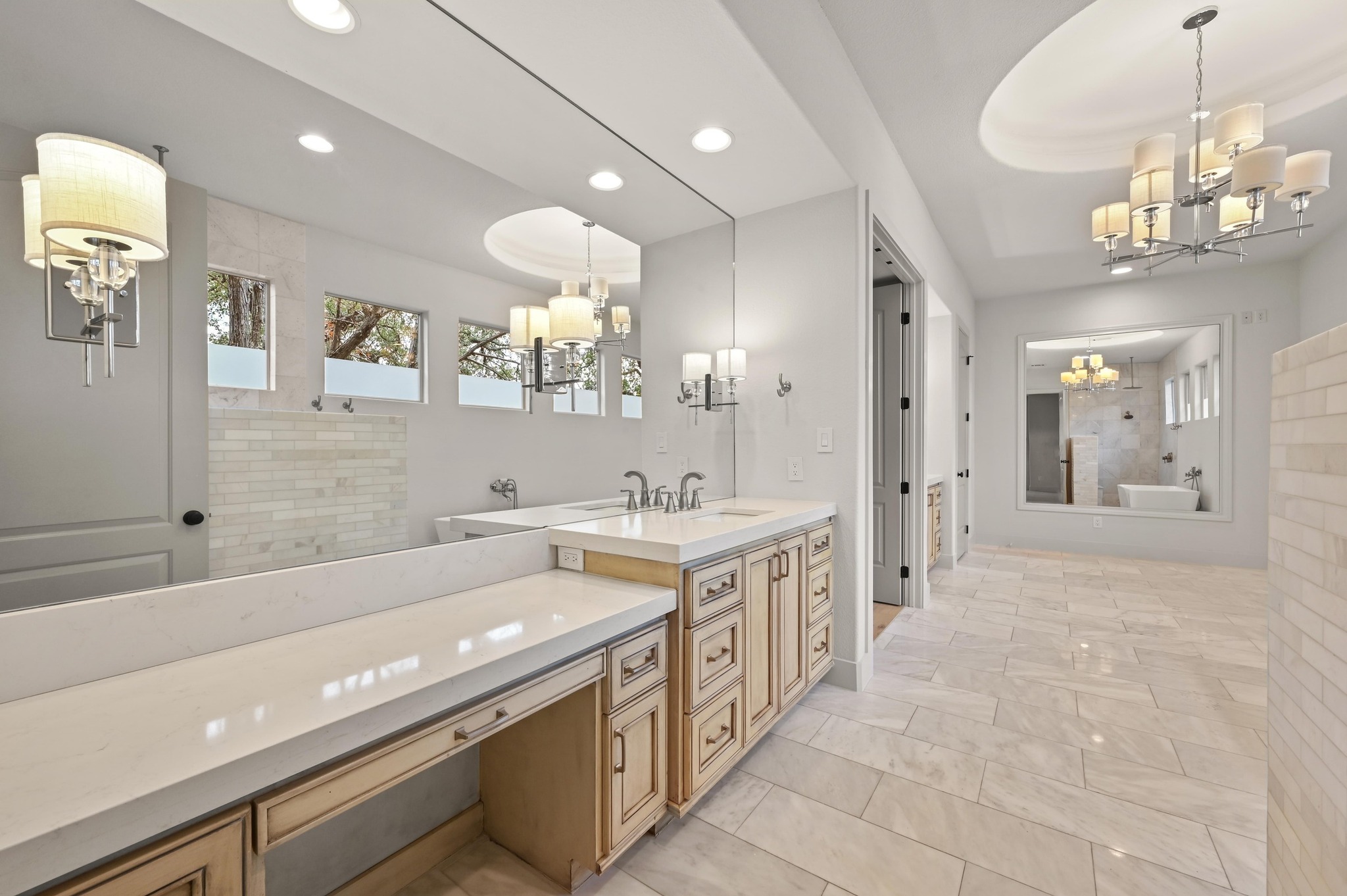 2800 Barton Point Drive Austin, TX 78733 - Photo 14 of 40 Bathroom with suspended lighting, walk in shower, vanity, a bathtub, and a raised ceiling