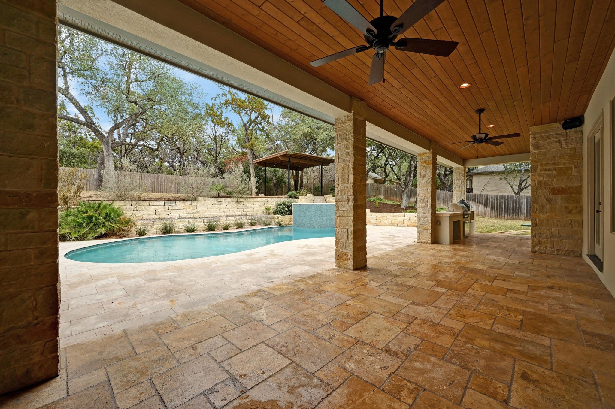 2800 Barton Point Drive Austin, TX 78733 - Photo 27 of 40 View of swimming pool featuring a fenced backyard and patio surround