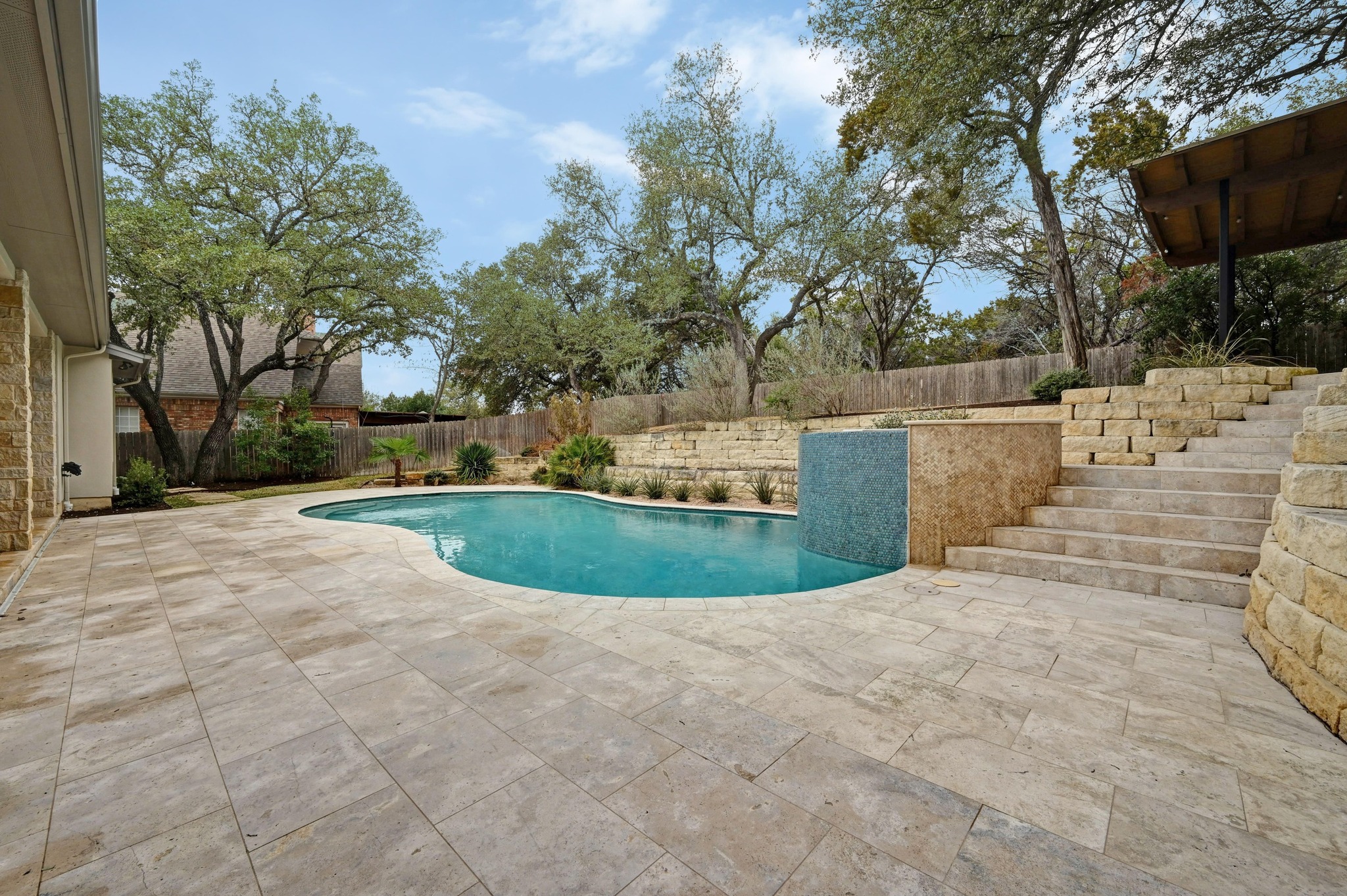 2800 Barton Point Drive Austin, TX 78733 - Photo 29 of 40 View of swimming pool featuring patio surround and a fenced backyard