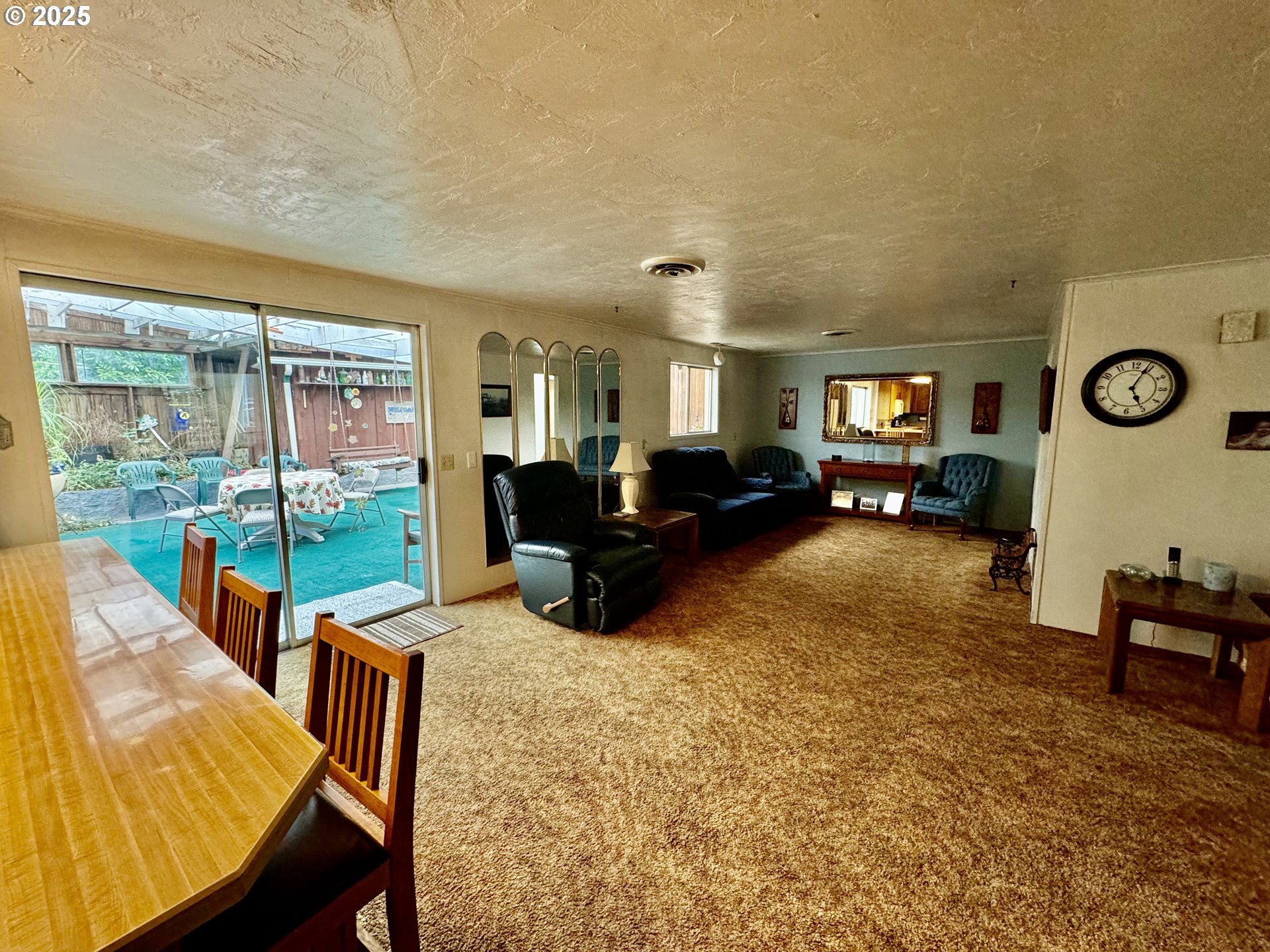 4990 Mitchell Loop Road Florence, OR 97439 - Photo 15 of 35 a living room filled with furniture